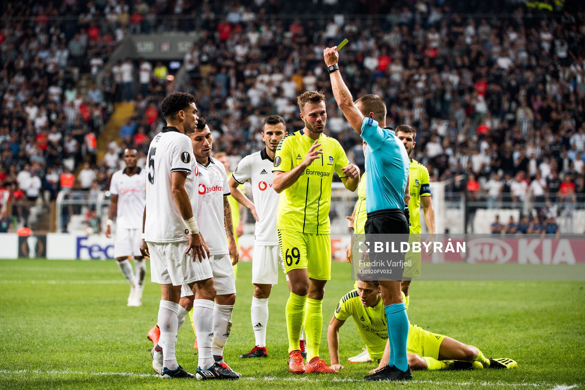 Pepe of Besiktas is shown a yellow card by the referee