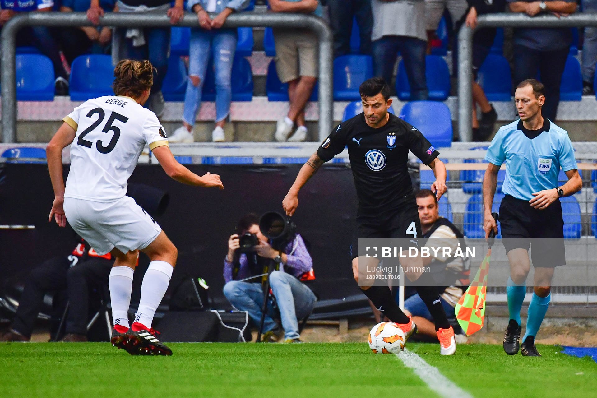 Sander Berge of Genk and Behrang Safari of Malmö FF