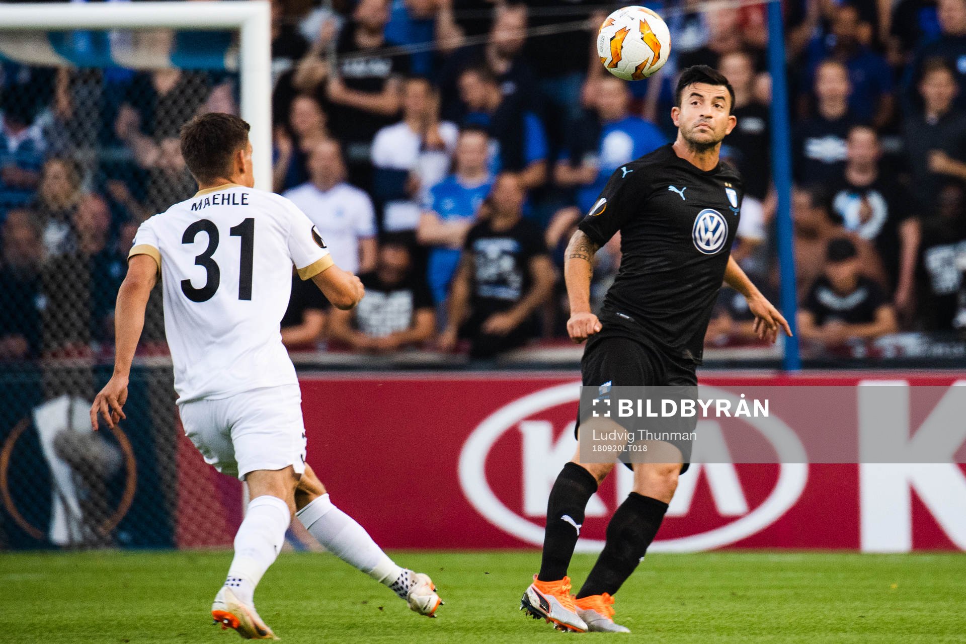 Joakim Maehle of Genk and Behrang Safari of Malmö FF