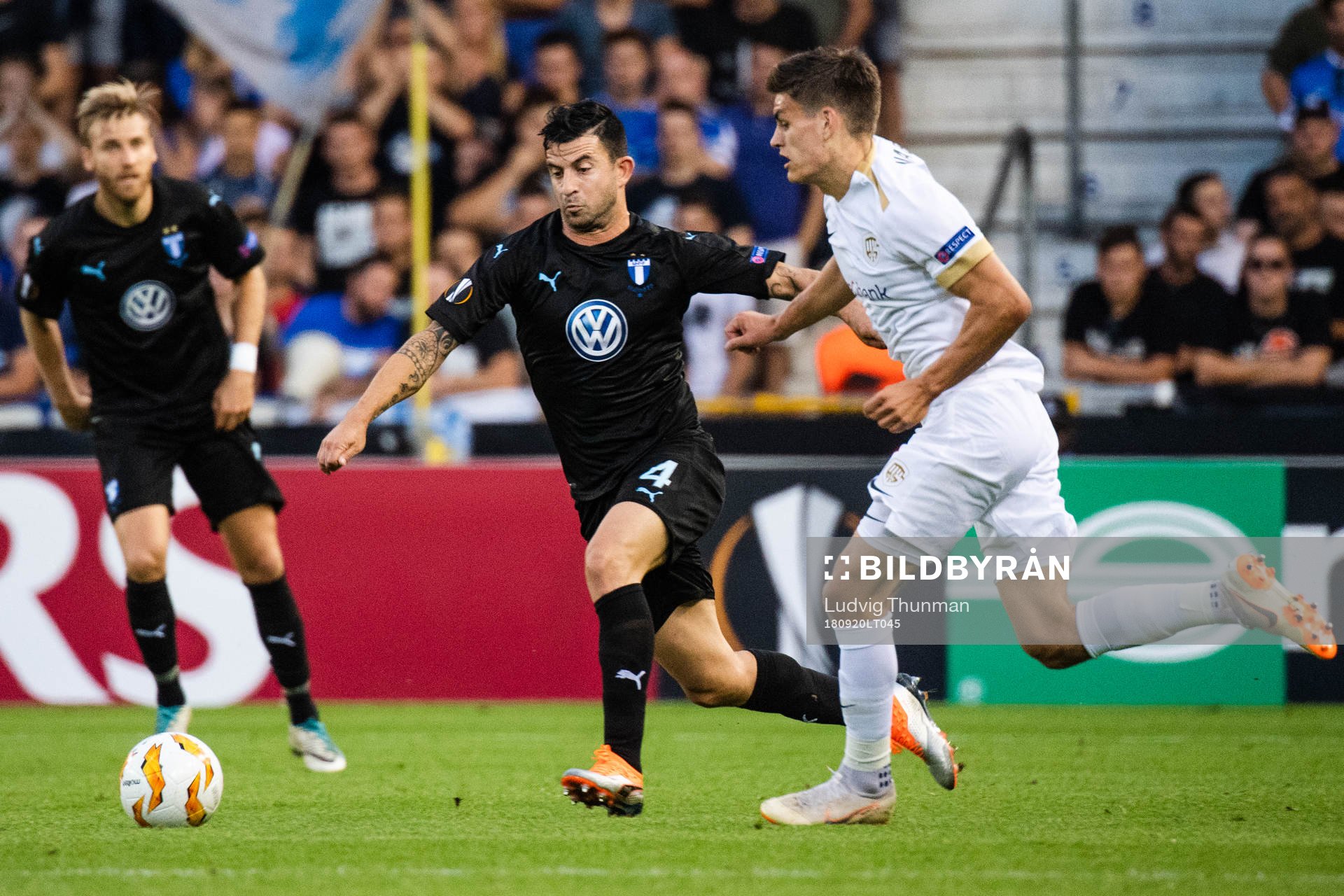 Behrang Safari of Malmö FF and Bojan Nastic of Genk