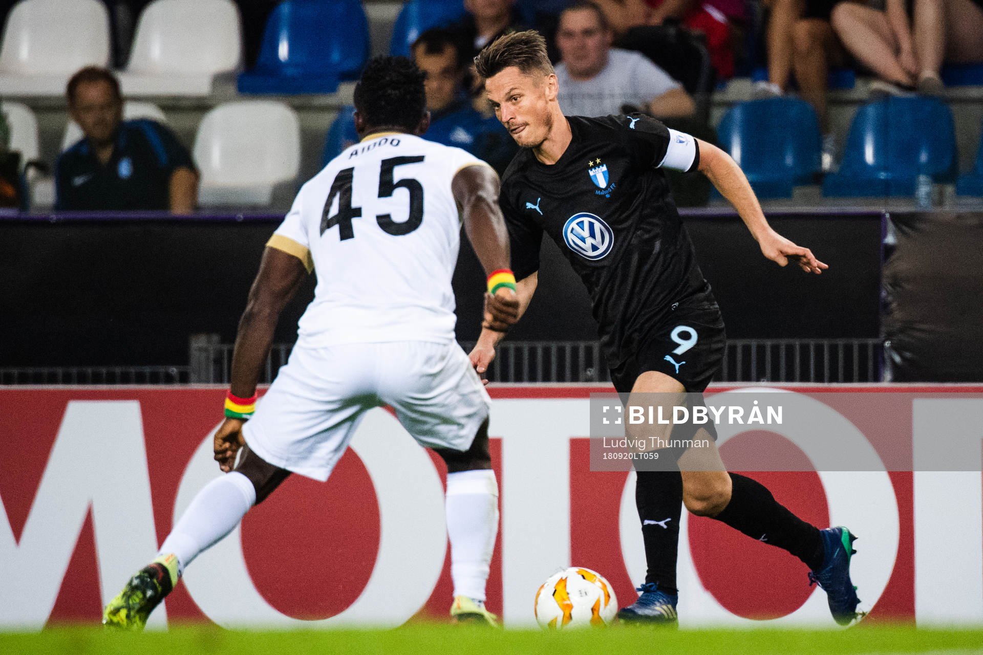 Joseph Aidoo of Genk and Markus Rosenberg of Malmö FF