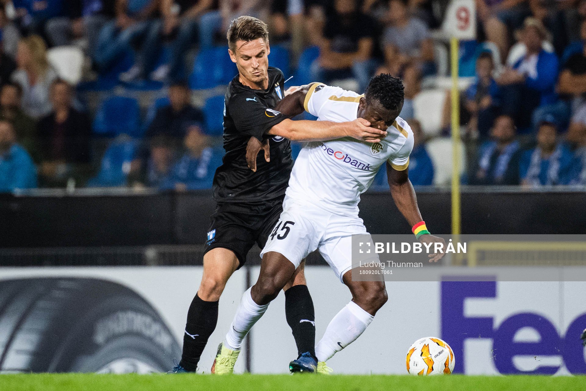 Markus Rosenberg of Malmö FF and Joseph Aidoo of Genk