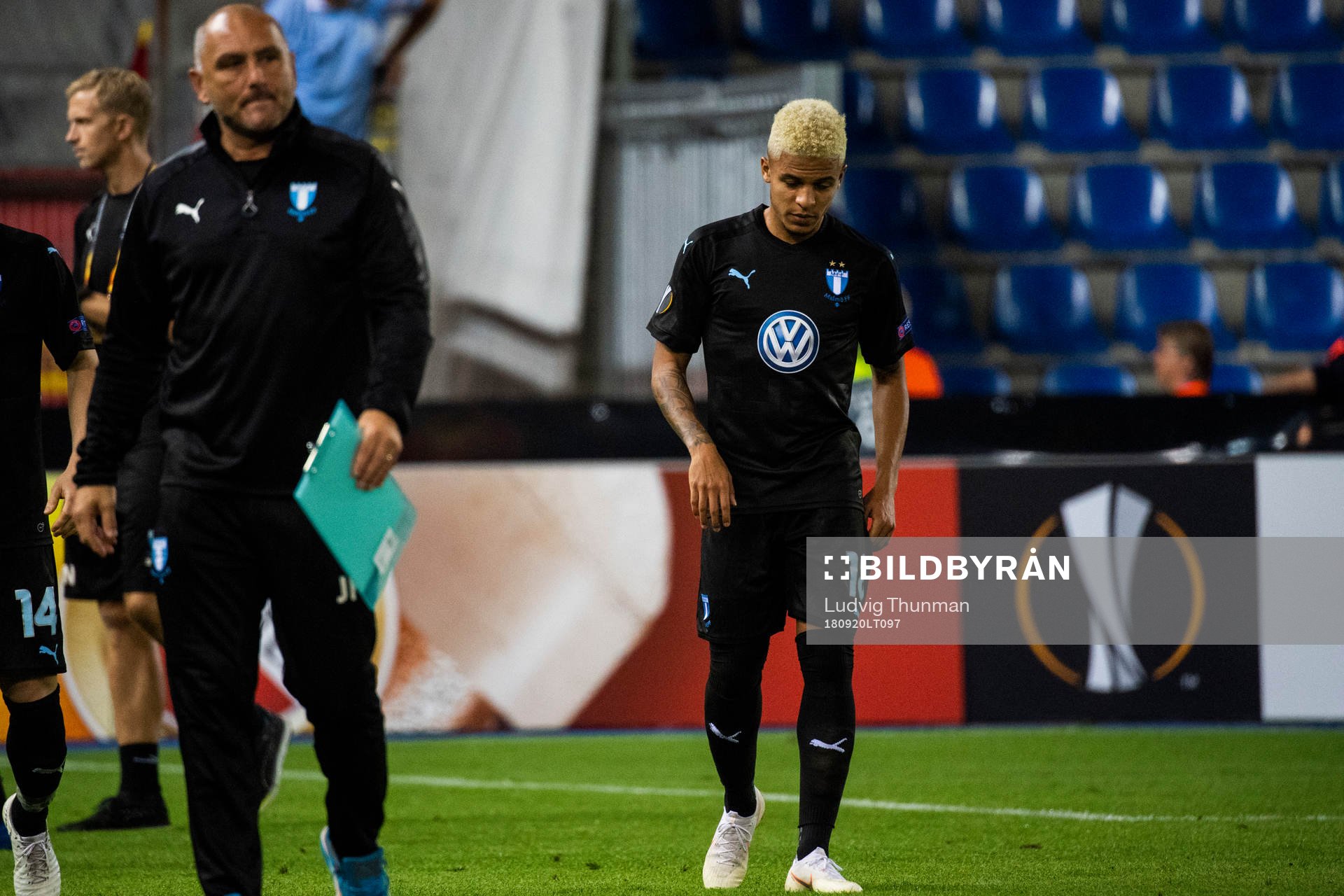 Goalkeeper coach Jonnie Fedel and Romain Gall looks dejected