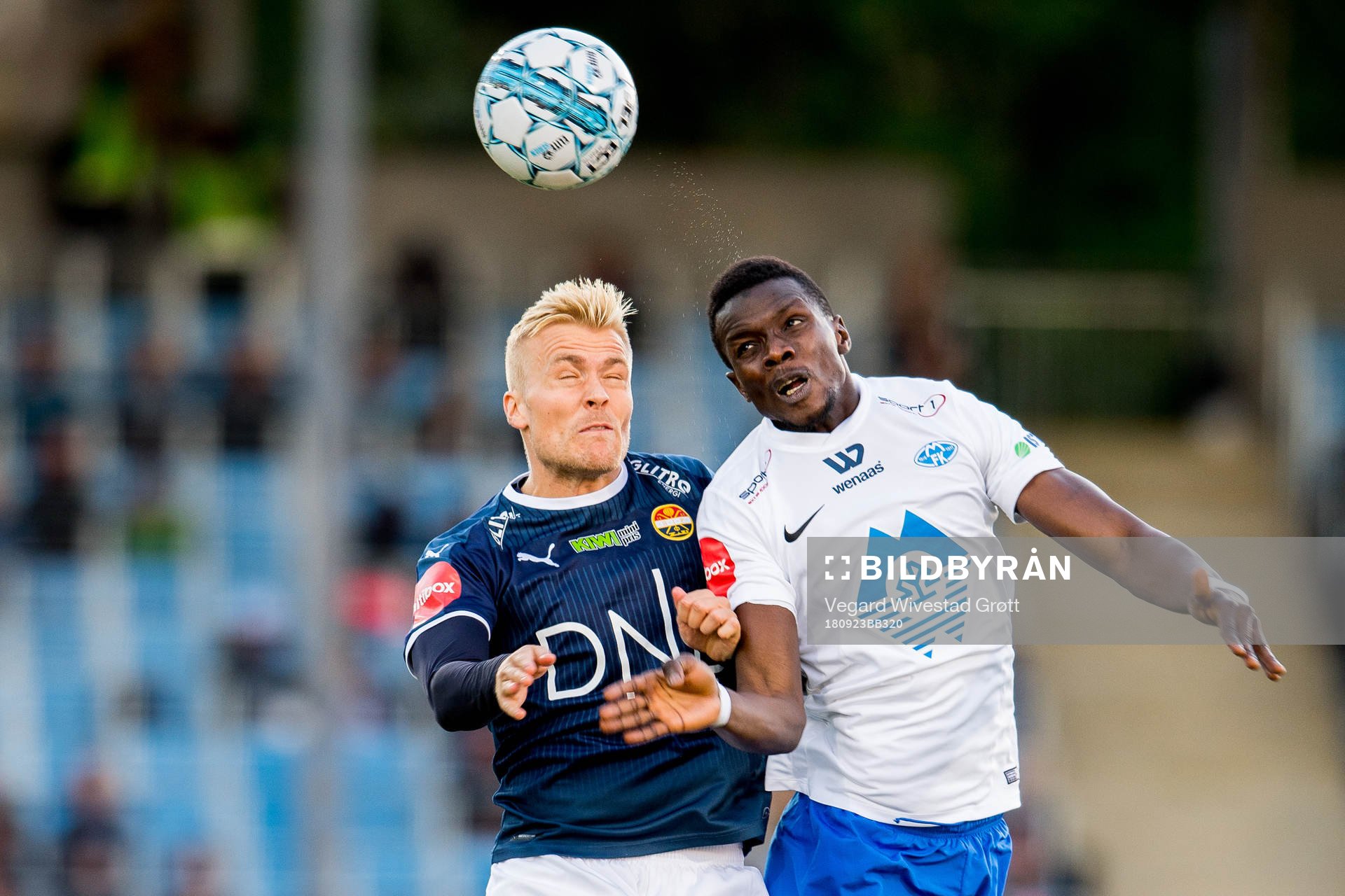 Eirik Ulland Andersen of Strømsgodset and Babacar Sarr of
