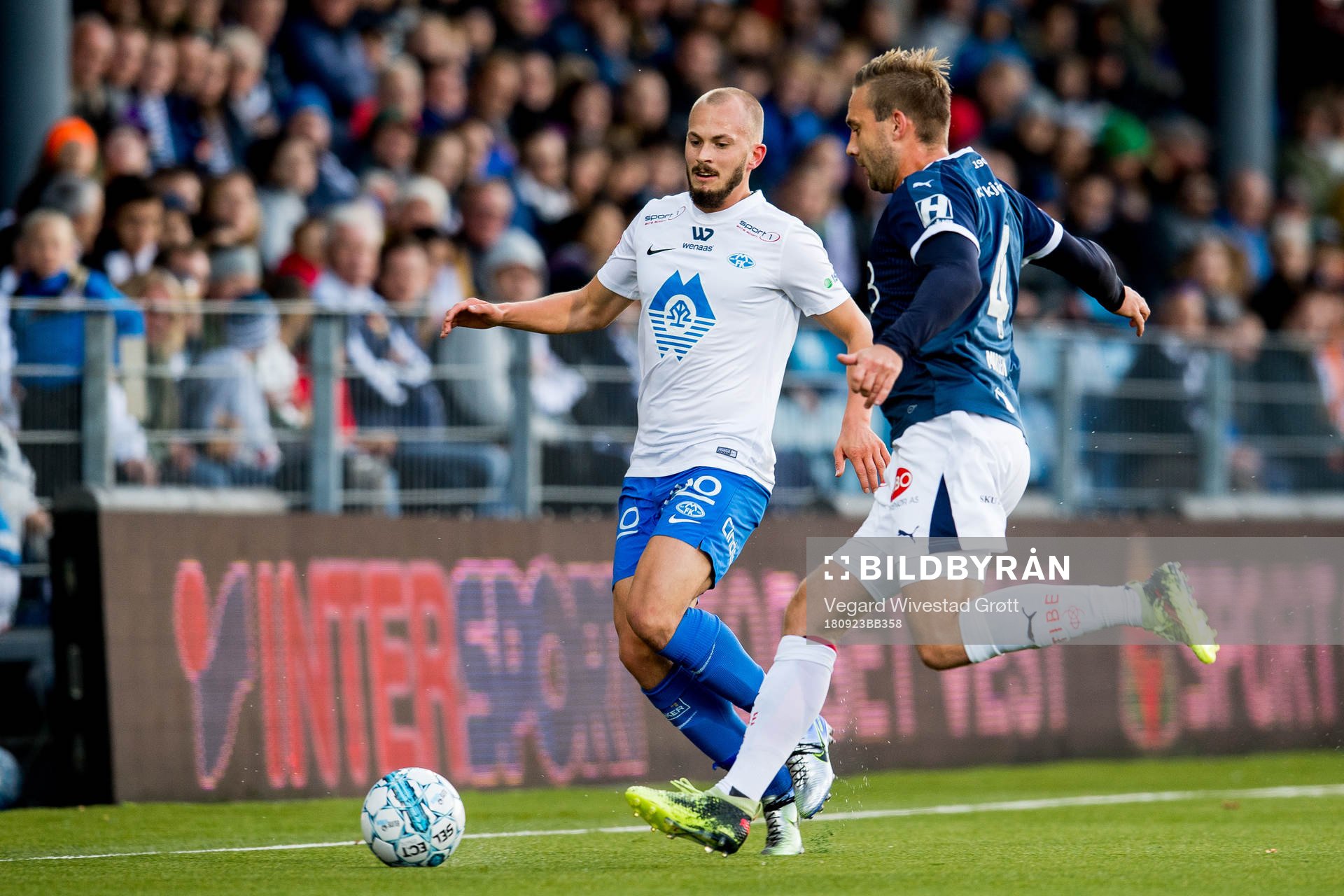 Eirik Hestad of Molde and Kim André Madsen of Strømsgodset