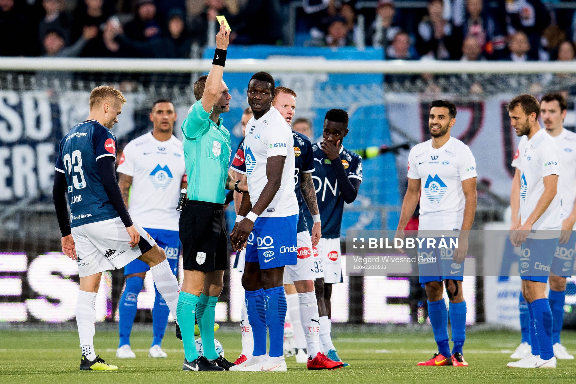 Espen Andreas Eskås, referee, gives Babacar Sarr of Molde
