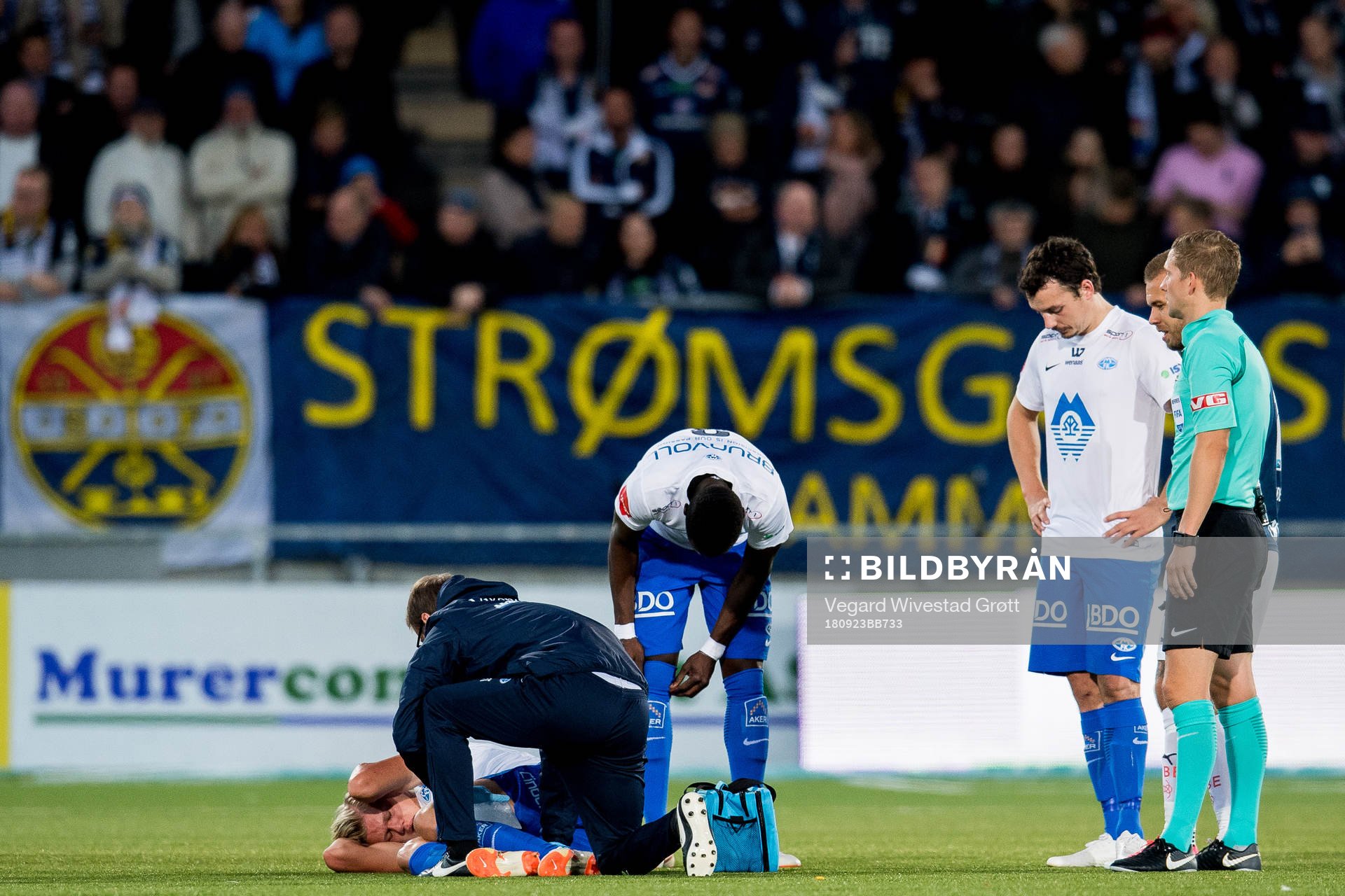 Erling Braut Håland of Molde lies down with an injury