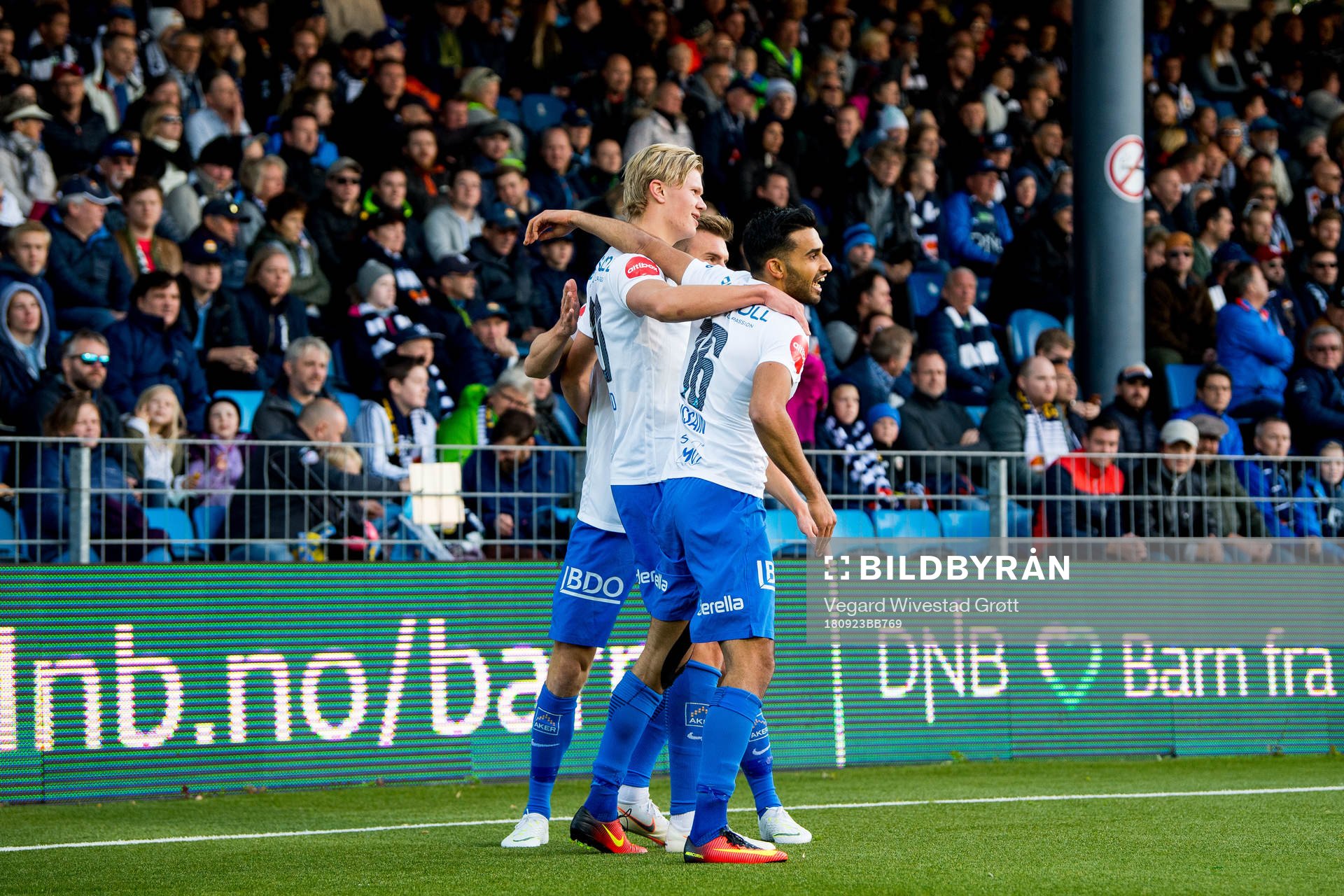 Erling Braut Håland of Molde celebrates with teammate Etzaz Hussain after scoring 0-1 during the Eliteserien match between Strømsgodset and Molde on September 23, 2018 in Drammen.
