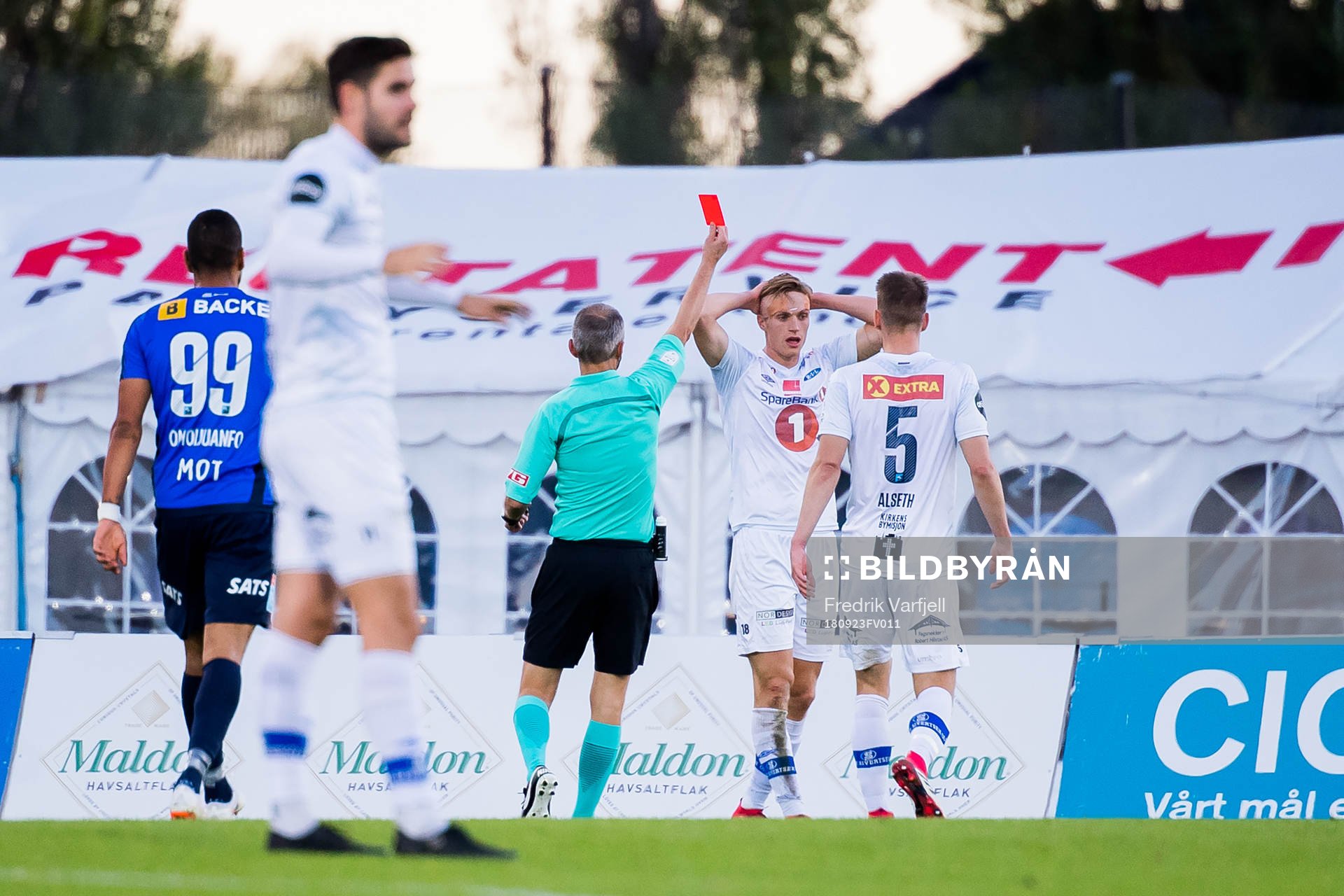 Ivar Furu of Ranheim is shown a red card by referee Tommy