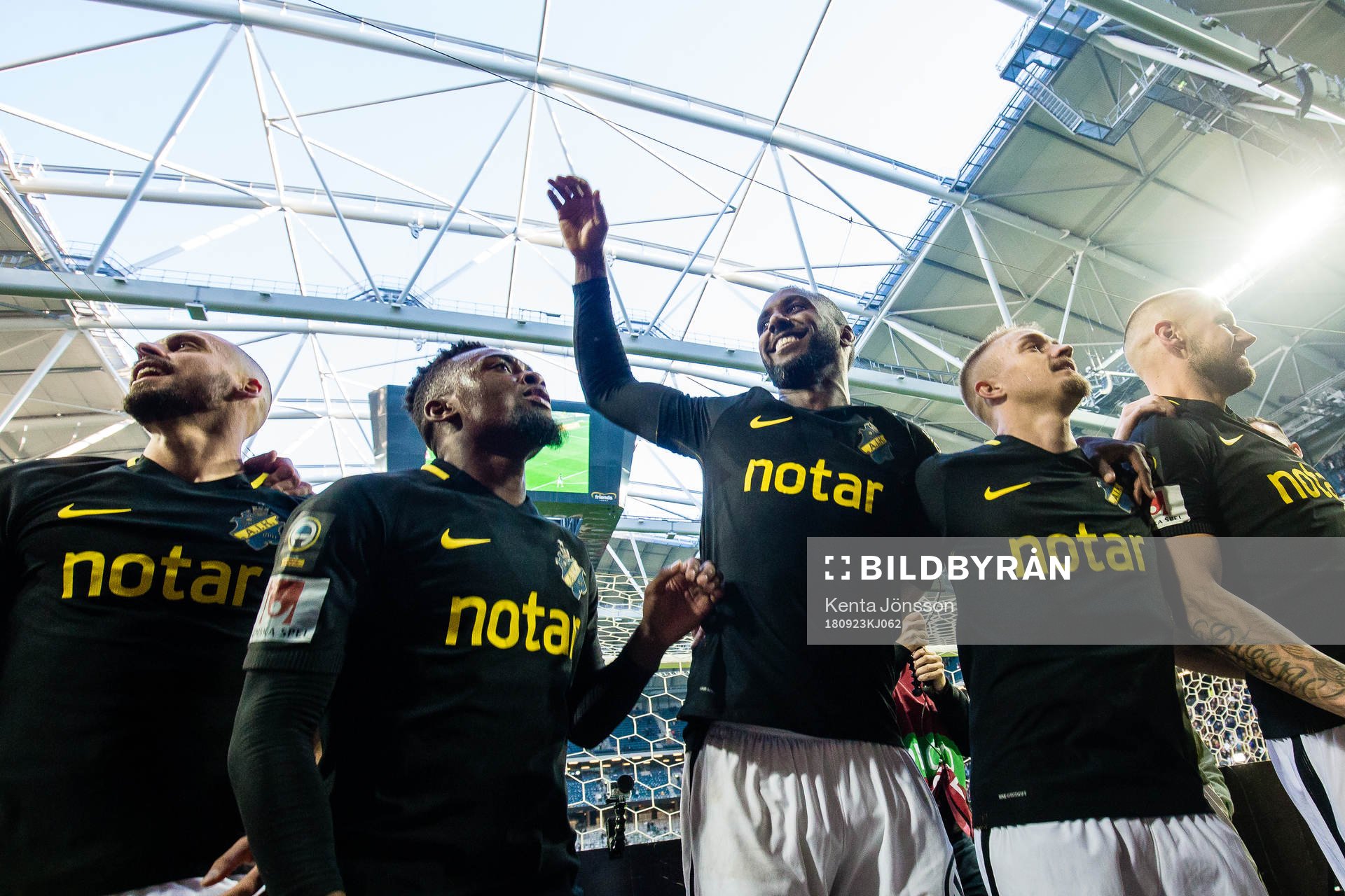 AIK:s Henok Goitom jublar med Heradi Rashidi , Alexander Milosevic efter fotbollsmatchen i Allsvenskan mellan AIK och Hammarby den 23 September 2018 i Stockholm.