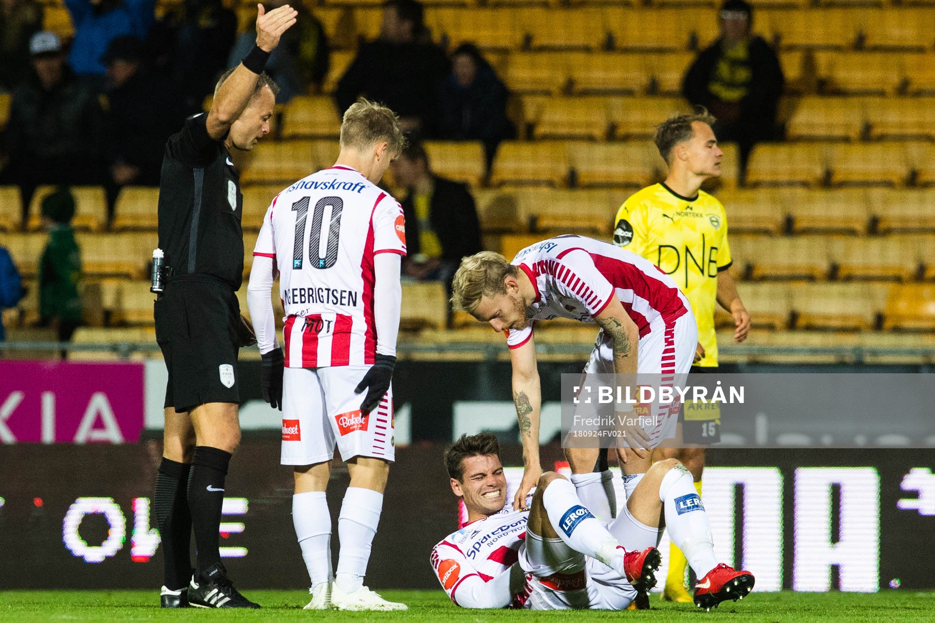 Simen Wangberg of Tromsø lies down injured