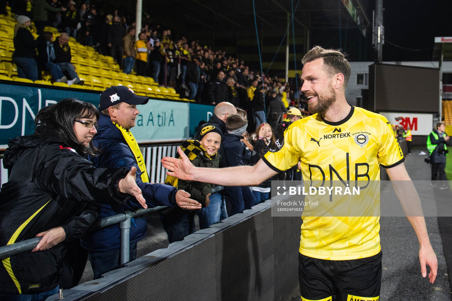 Arnor Smarason of Lillestrøm celebrates with fans
