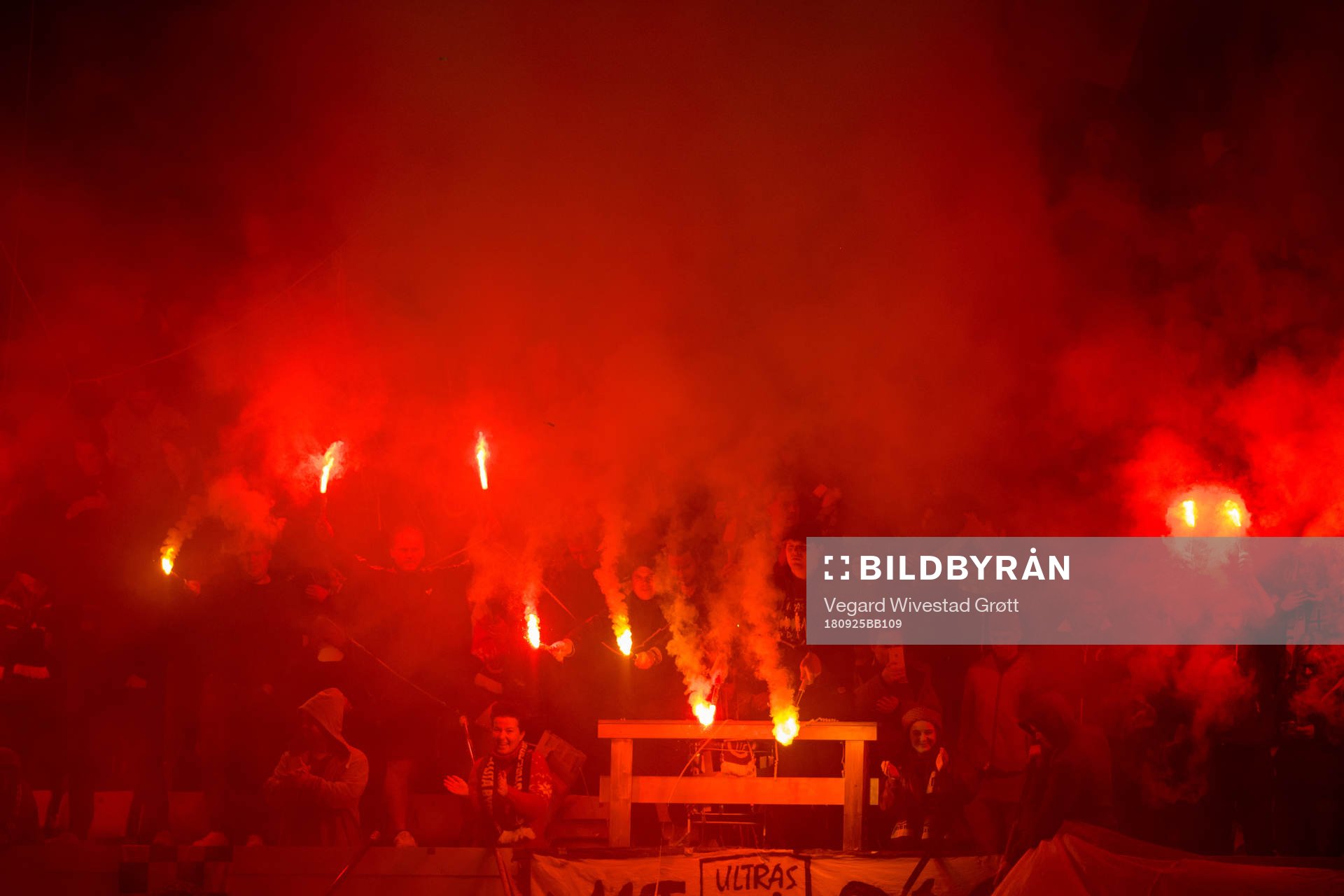 Fans of Mjøndalen with pyro