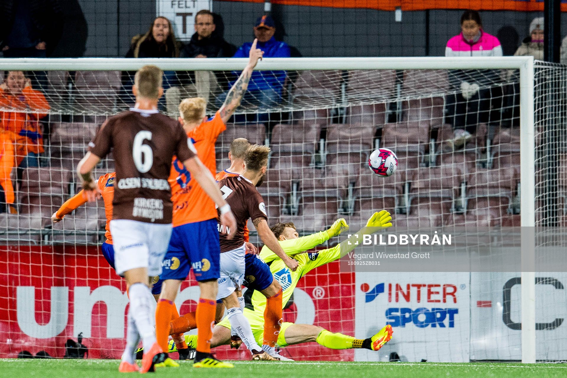 Tonny Brochmann of Mjøndalen scores 1-0 behind goalkeeper