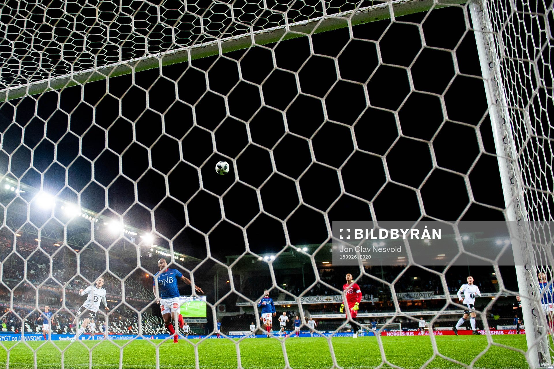 Djordje Denic of Rosenborg scores the 1-0 goal behind