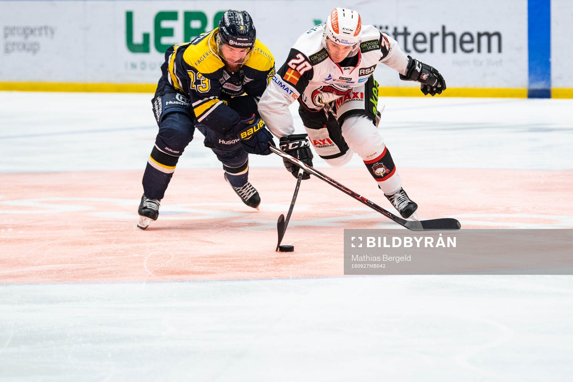 s Robin Figren och Malmö Redhawks Henrik Hetta i kamp om