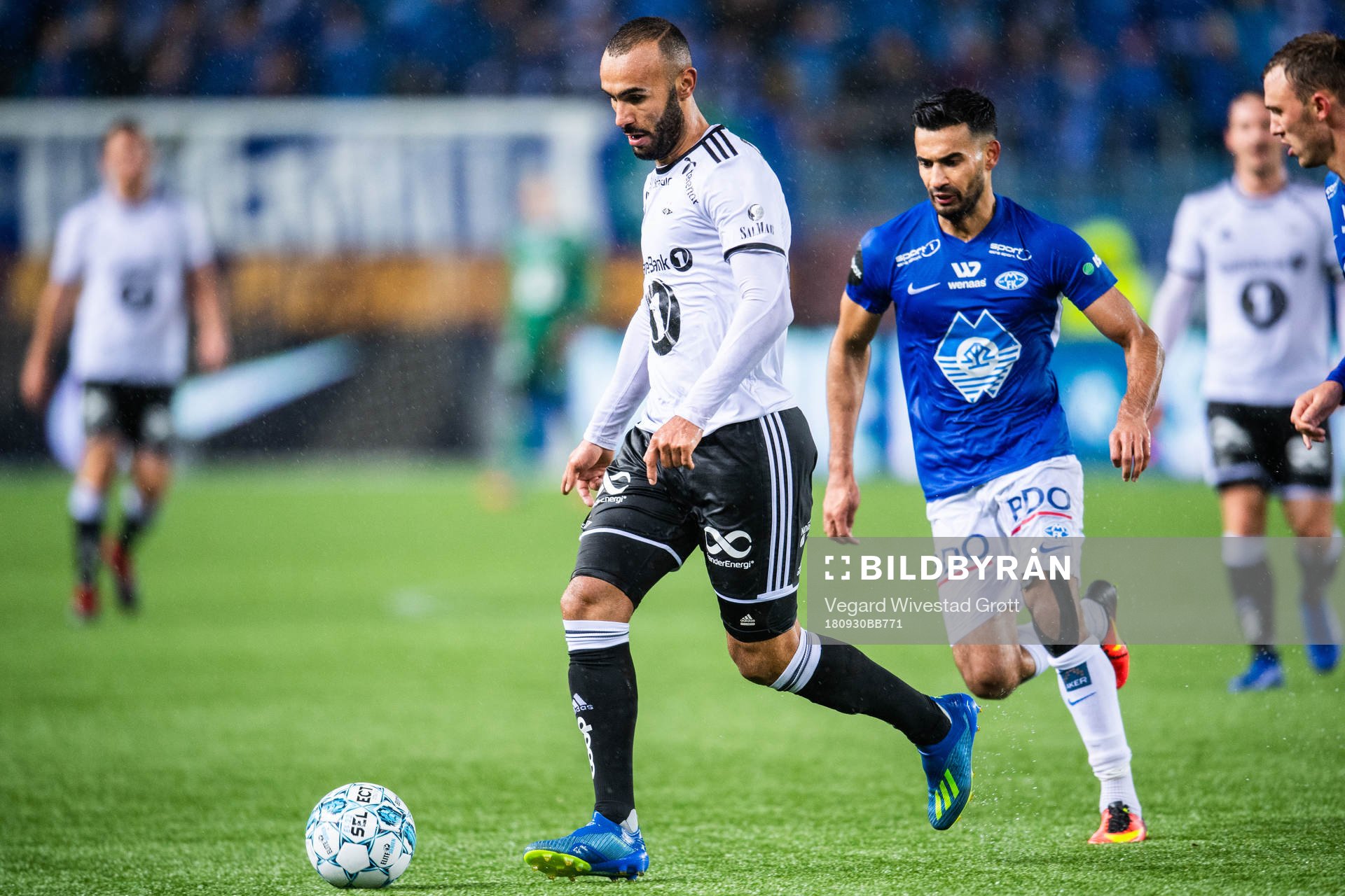 Issam Jebali of Rosenborg and Etzaz Hussain of Molde