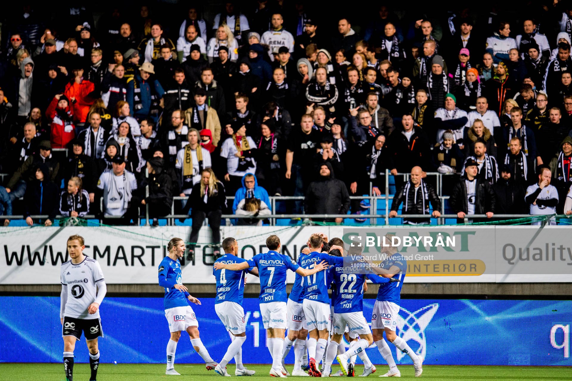 Vegard Forren of Molde (hidden) celebrates with teammates