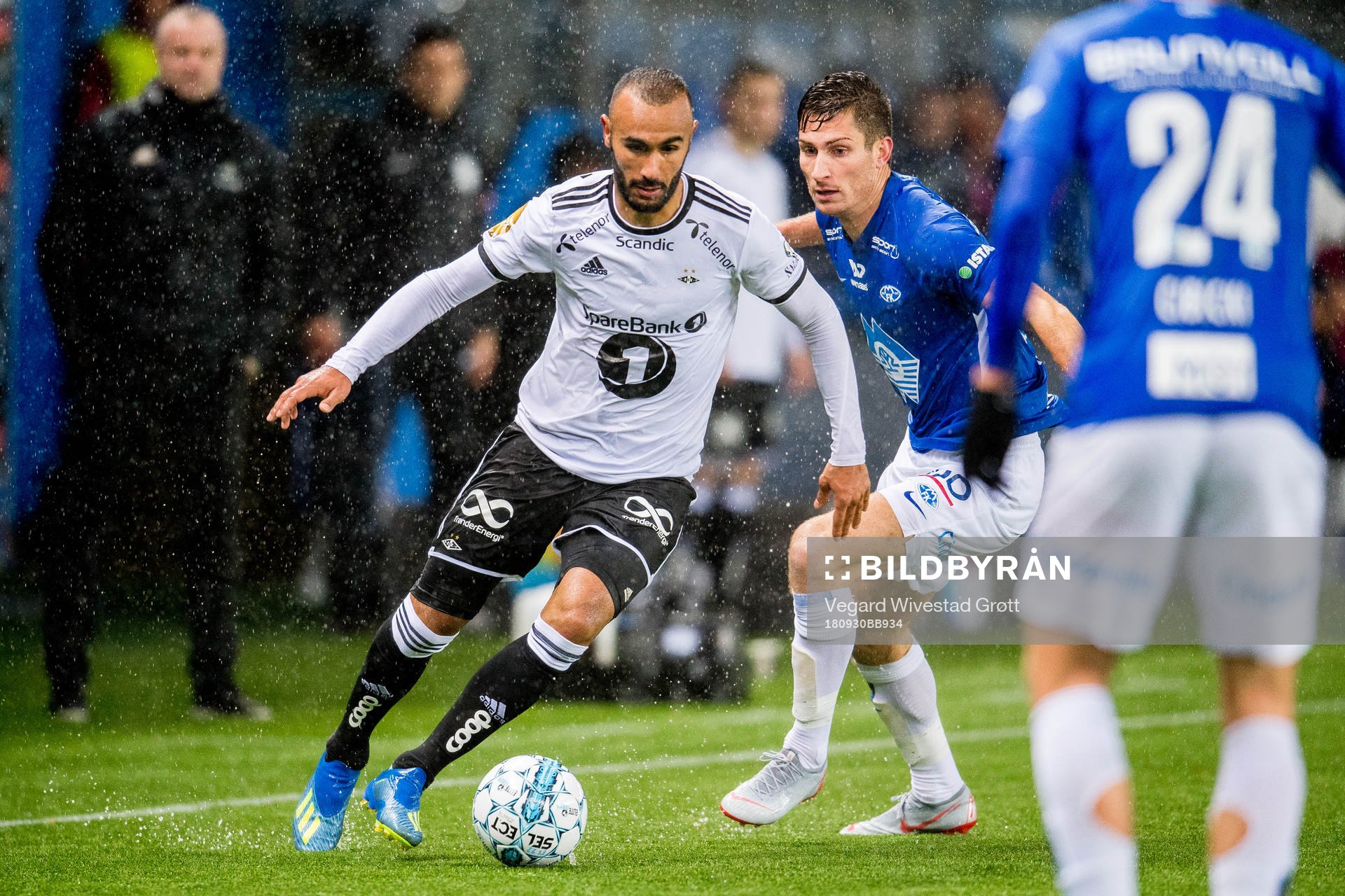 Issam Jebali of Rosenborg and Christoffer Remmer of Molde during the Eliteserien match between Molde and Rosenborg on September 30, 2018 in Molde.
