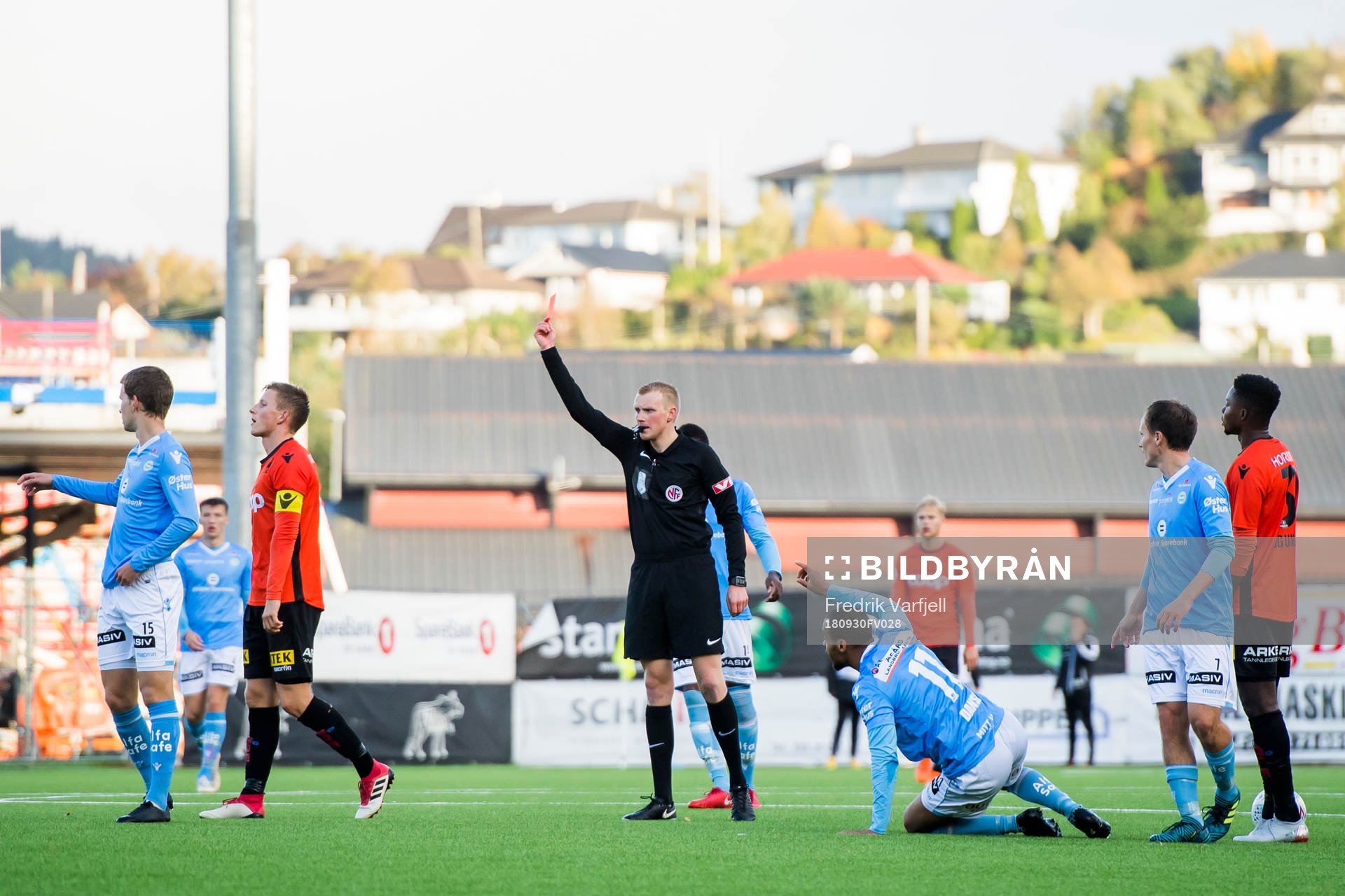 Jonas Hestetun of Åsane is shown a red card by referee