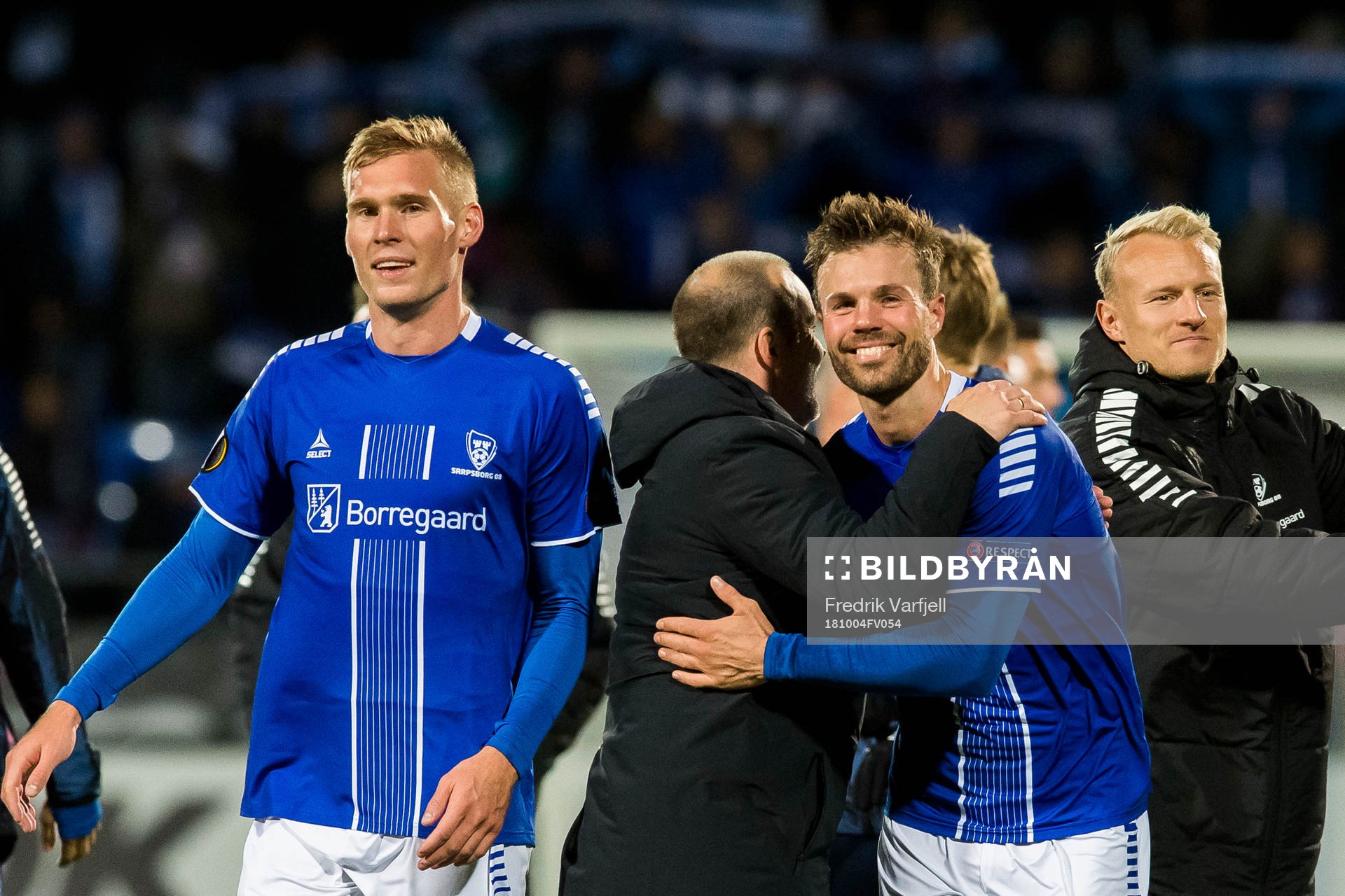 Joonas Tamm, Geir Bakke, head coach of Sarpsborg 08, and Patrick Mortensen of Sarpsborg 08 celebrate after the Europa League match between Sarpsborg 08 and Genk on October 4, 2018 in Sarpsborg.