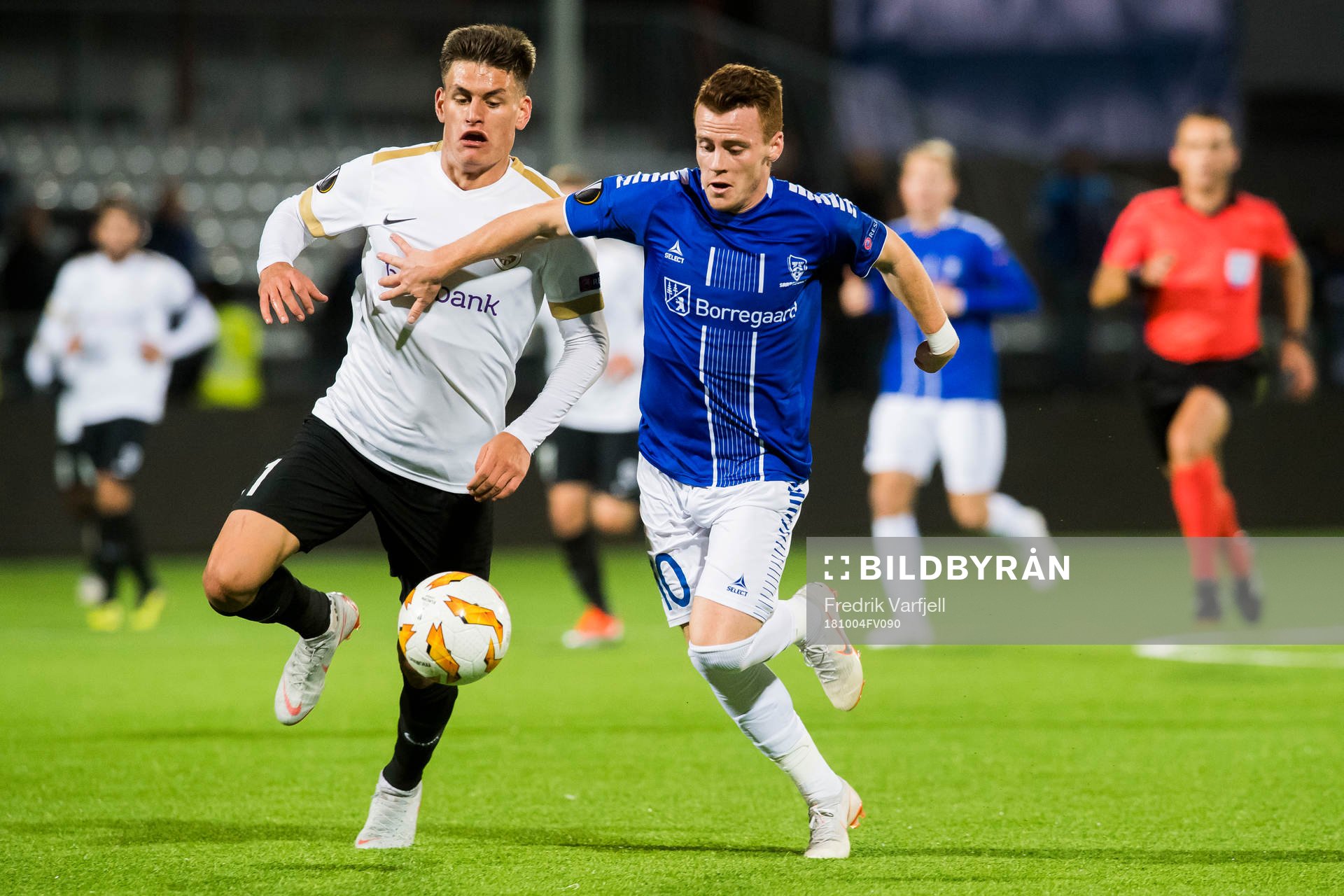 Joakim Maehle of Genk and Tobias Heintz of Sarpsborg 08 during the Europa League match between Sarpsborg 08 and Genk on October 4, 2018 in Sarpsborg.