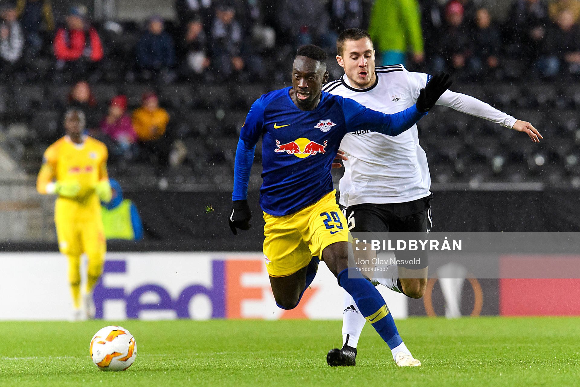 Jean-Kevin Augustin of RB Leipzig and Djordje Denic of