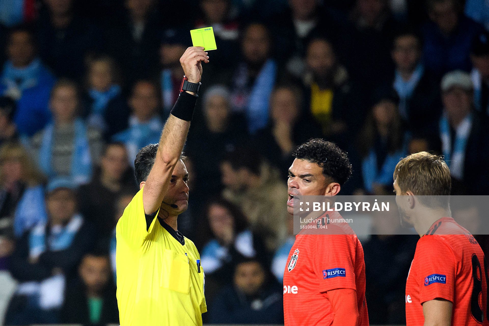 Pepe of Besiktas is shown the yellow card