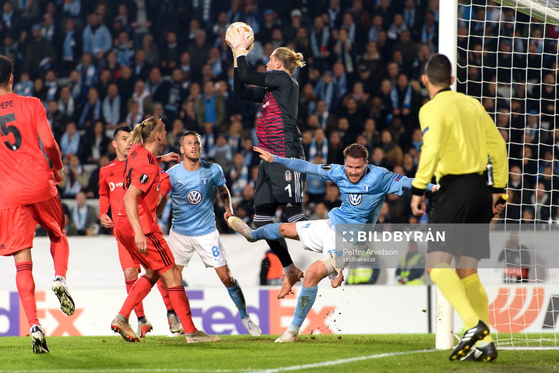 Lasse Nielsen of Malmö FF and Goalkeeper Loris Karius of