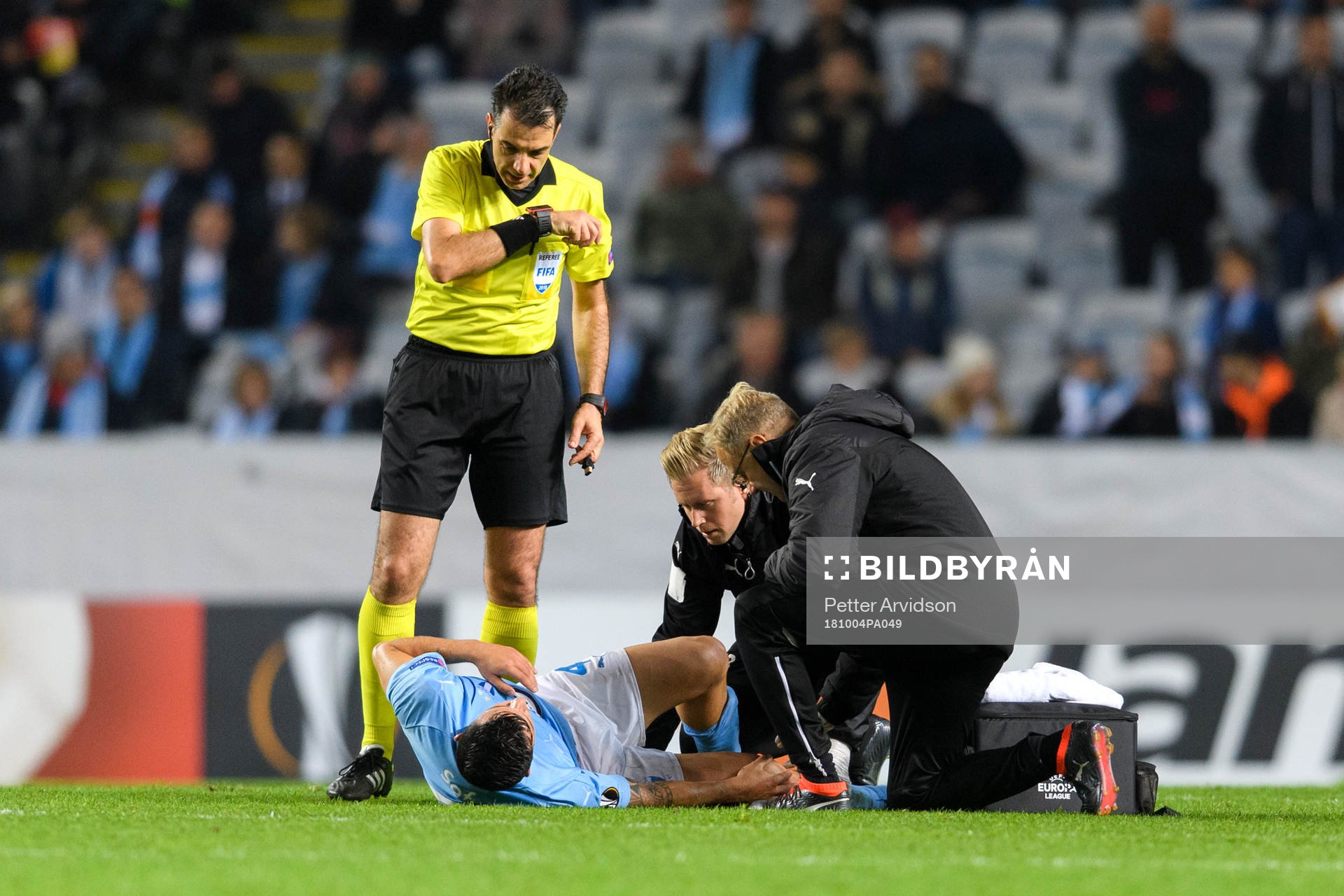 Behrang Safari of Malmö FF recives medical attention