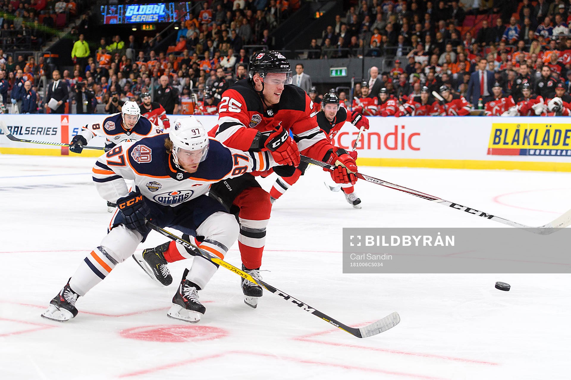 Connor McDavid of the Edmonton Oilers and Mirco Mueller of