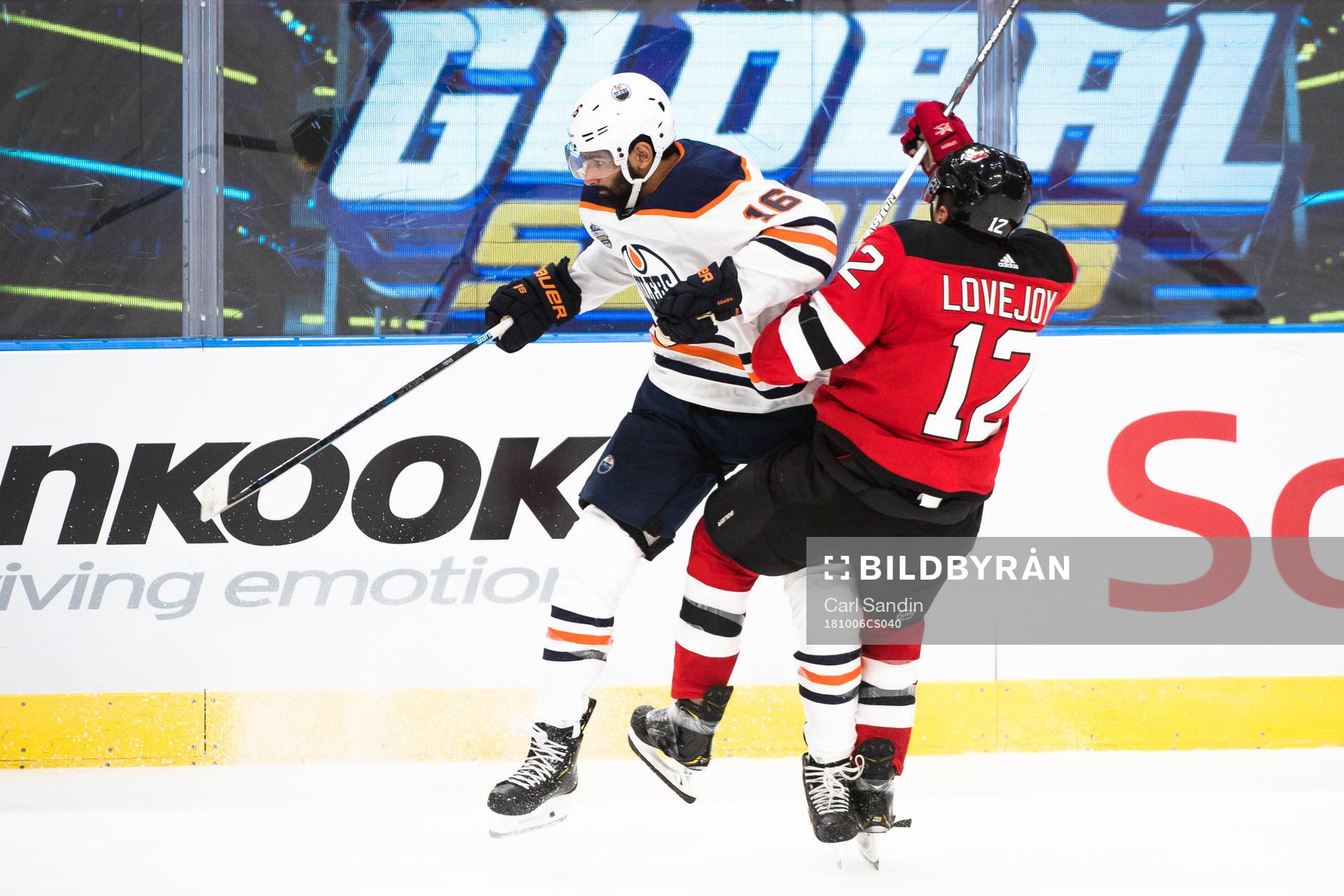 Jujhar Khaira of the Edmonton Oilers and Ben Lovejoy of the