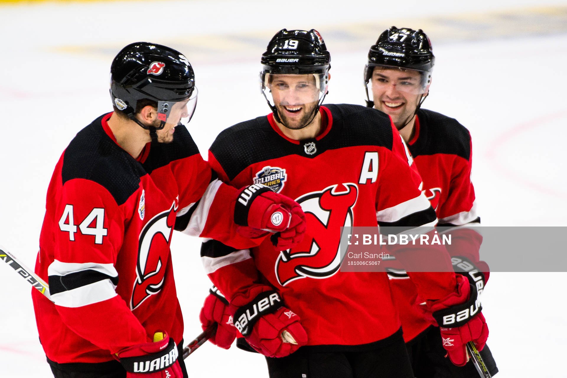 Miles Wood and John Quenneville of the New Jersey Devils