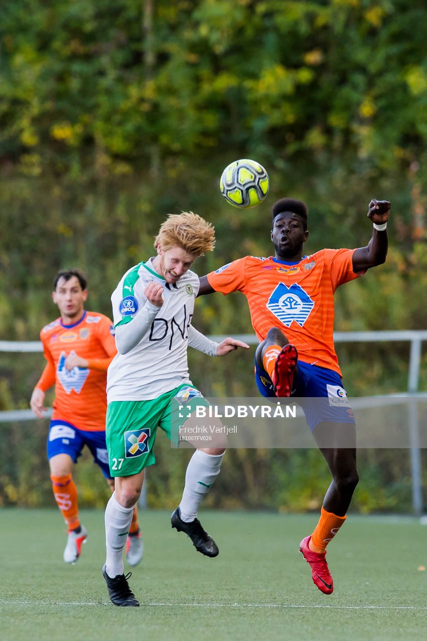Peder Nersveen of HamKam and Pape Habib Gueye of Aalesund