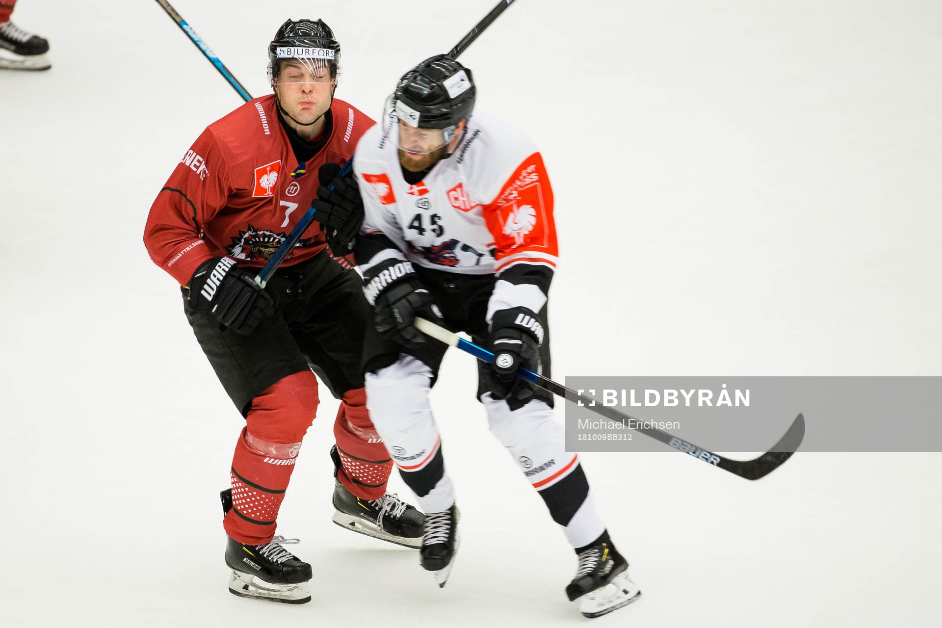 Mikkel Höjbjerg of Aalborg hits Pathrik Westerholm of
