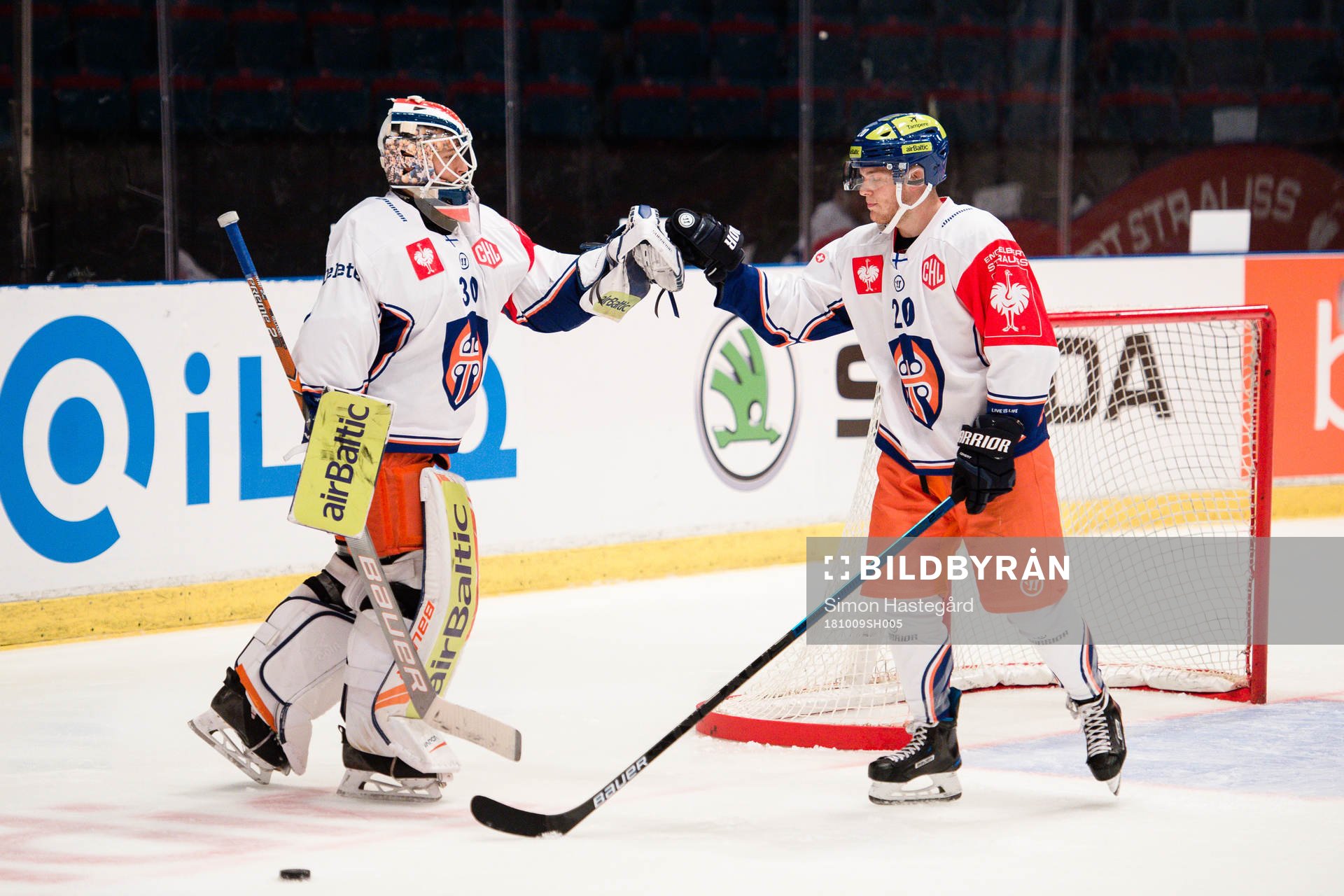 Goalkeeper Christian Heljanko and Nikko Ojamäki of Tappara