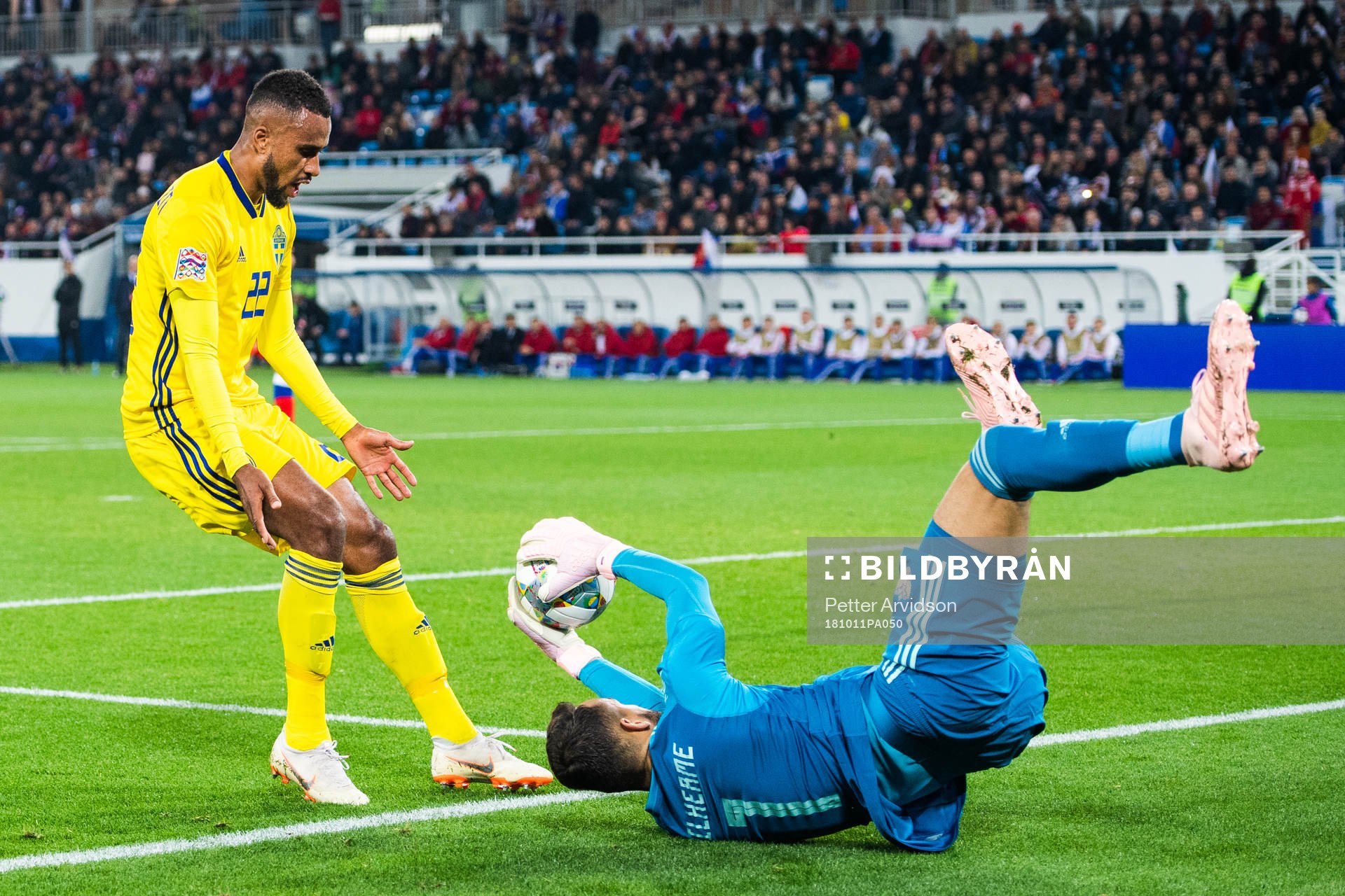 Isaac Kiese Thelin of Sweden and goalkeeper Guilherme of