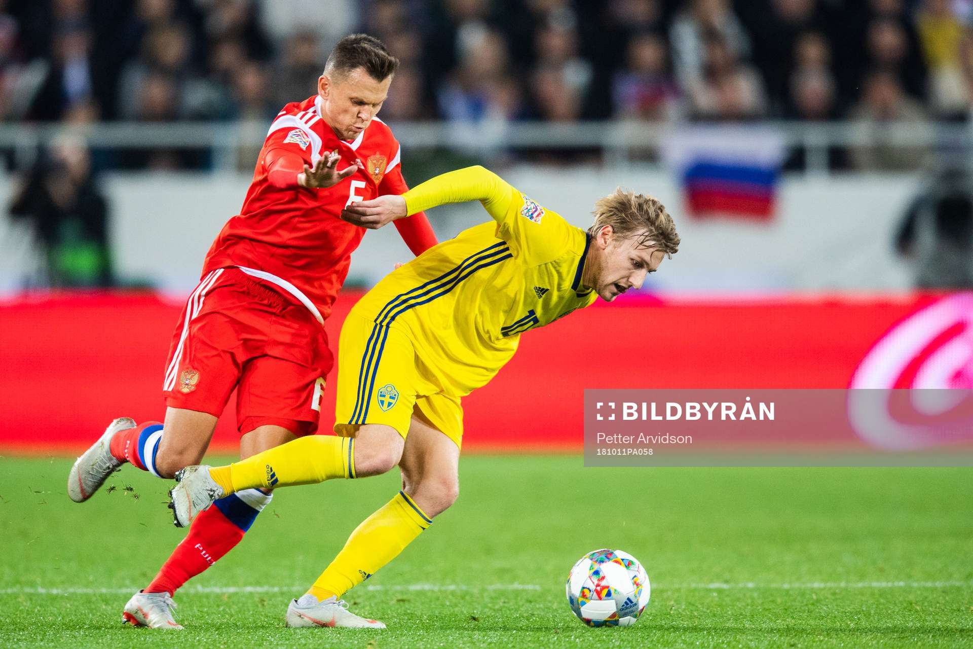 Emil Forsberg of Sweden and Denis Cheryshev of Russia competes for the ball during the Nations League match between Russia and Sweden on October 11, 2018 in Kaliningrad.