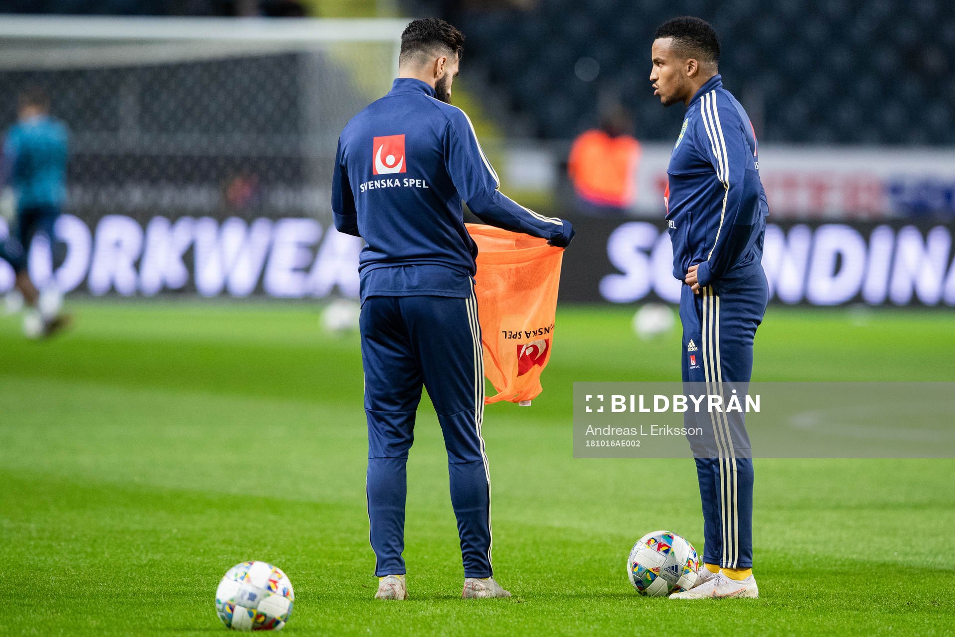 Jimmy Durmaz and Martin Olsson of Sweden  warms up