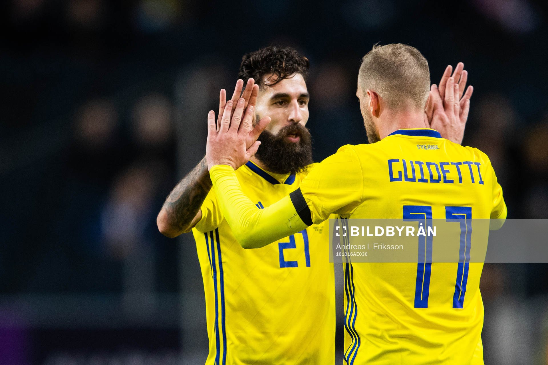 Jimmy Durmaz and John Guidetti of Sweden celebrates