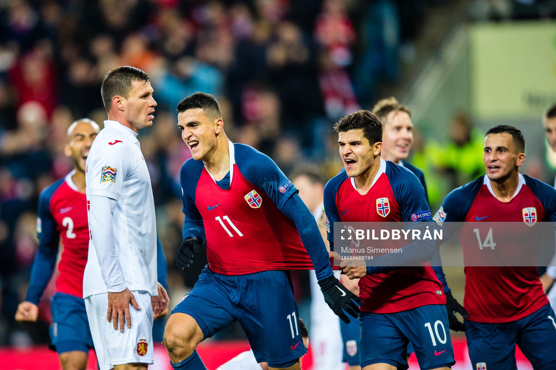 Mohamed Elyounoussi of Norway celebrates with teammates