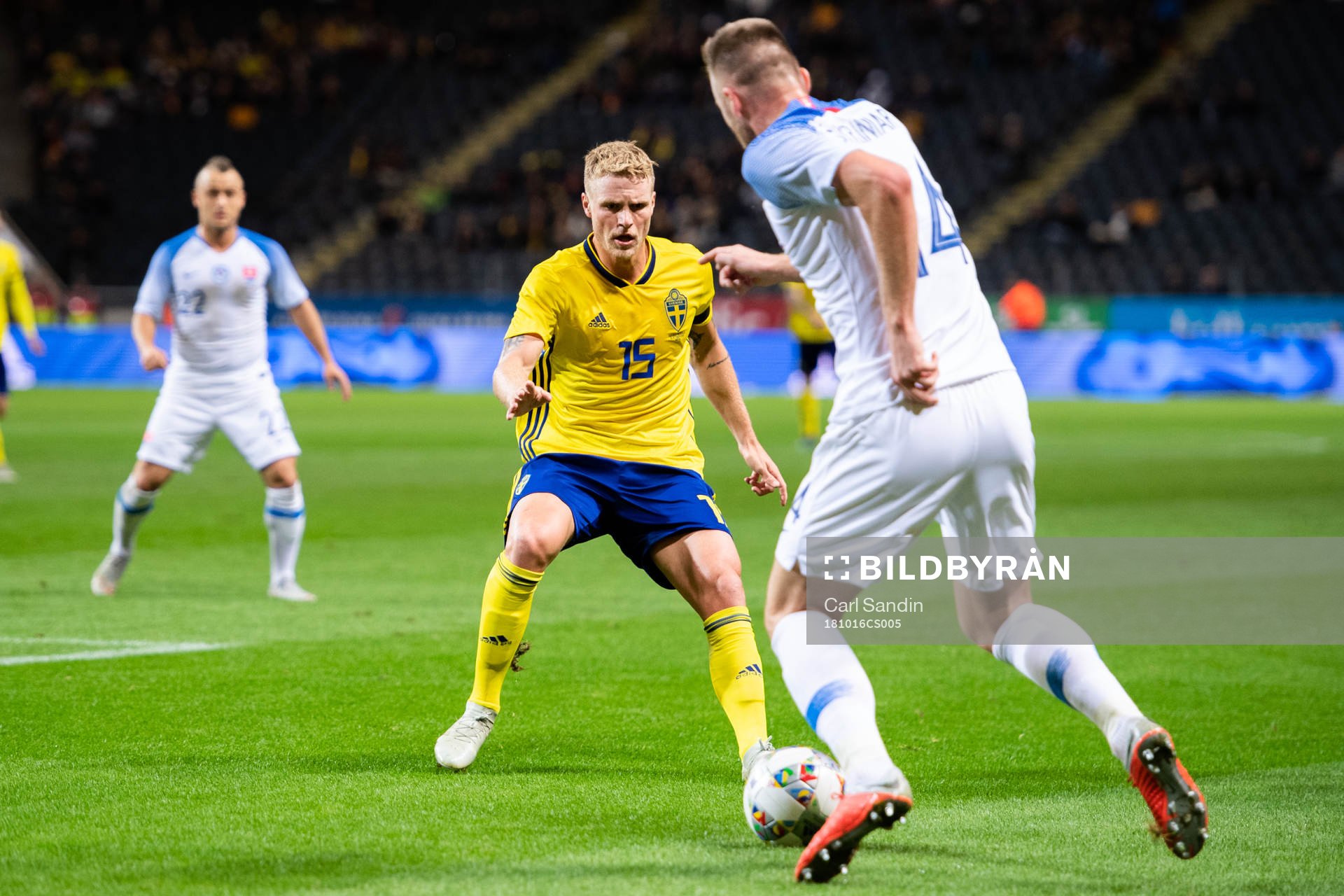 Oscar Hiljemark of Sweden and Milan Skriniar of Slovakia