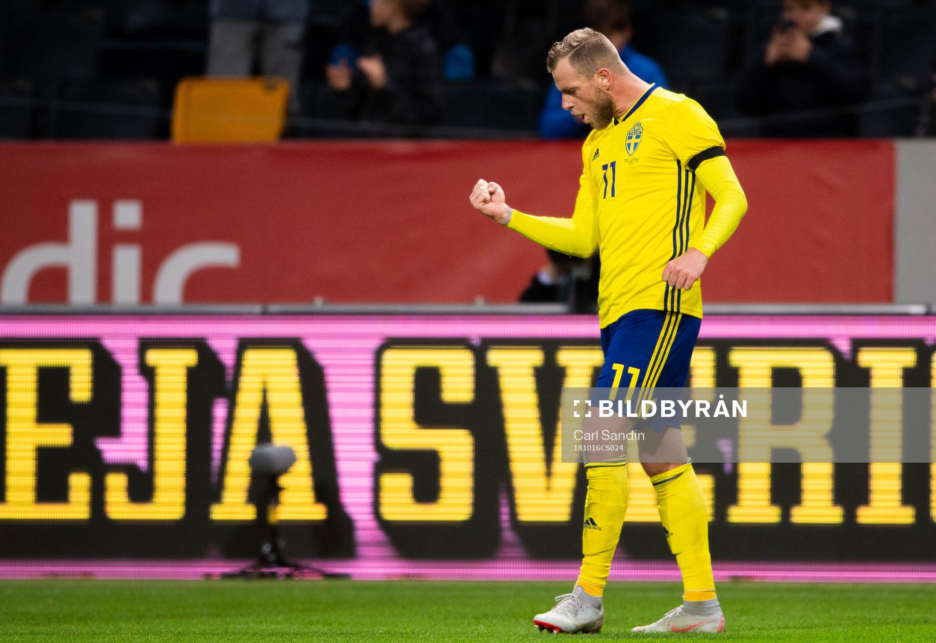 John Guidetti of Sweden celebrates