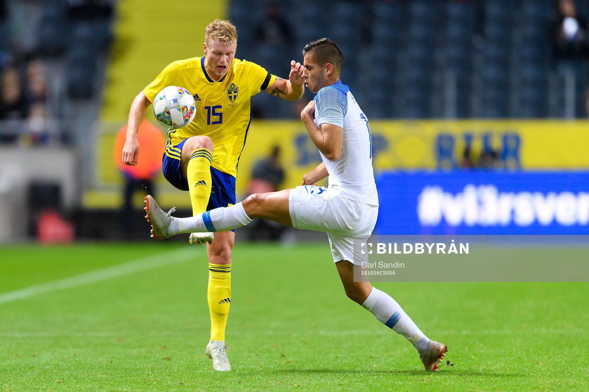 Oscar Hiljemark of Sweden and David Hancko of Slovakia