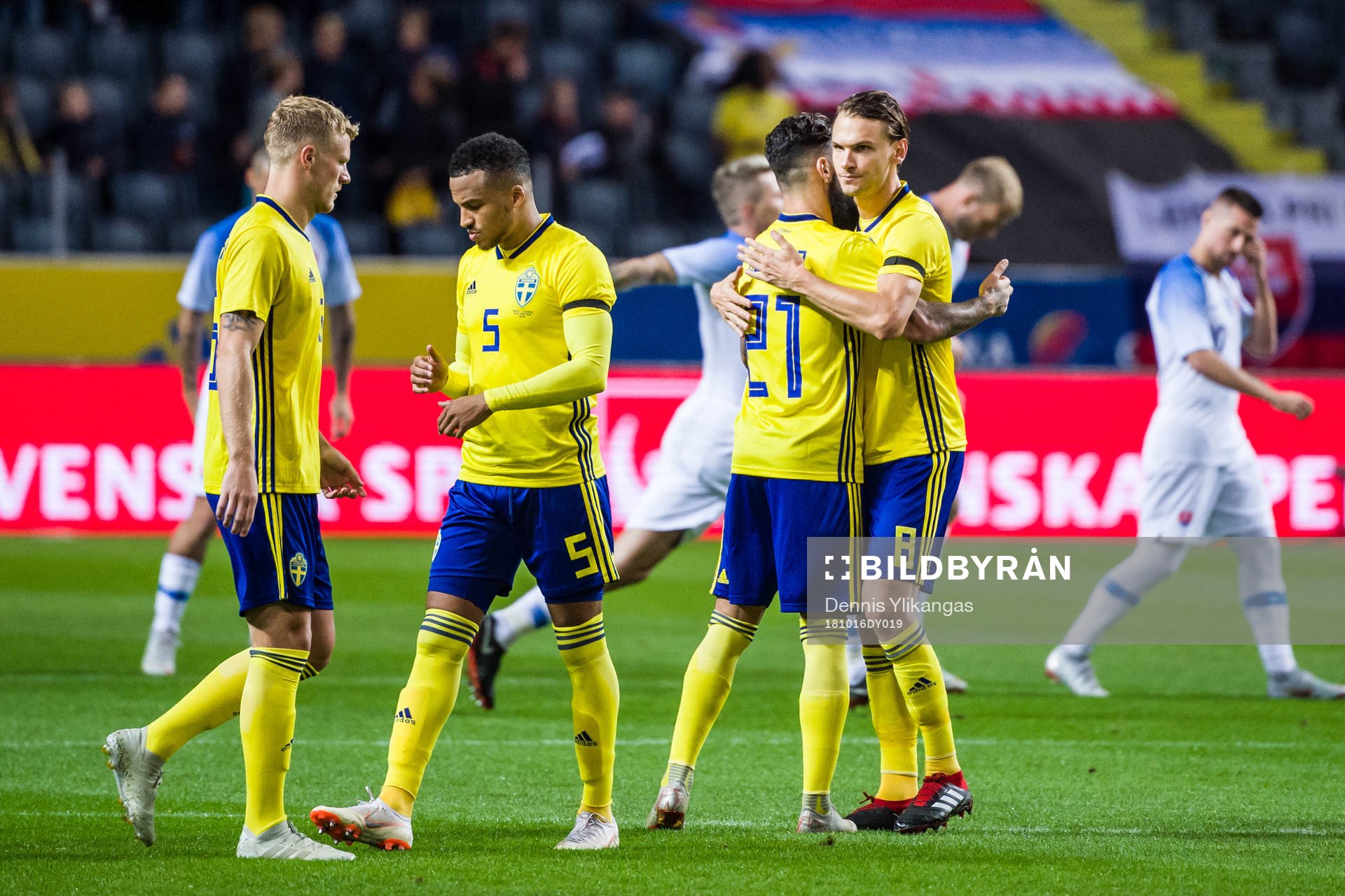 Jimmy Durmaz and Albin Ekdal hug each other