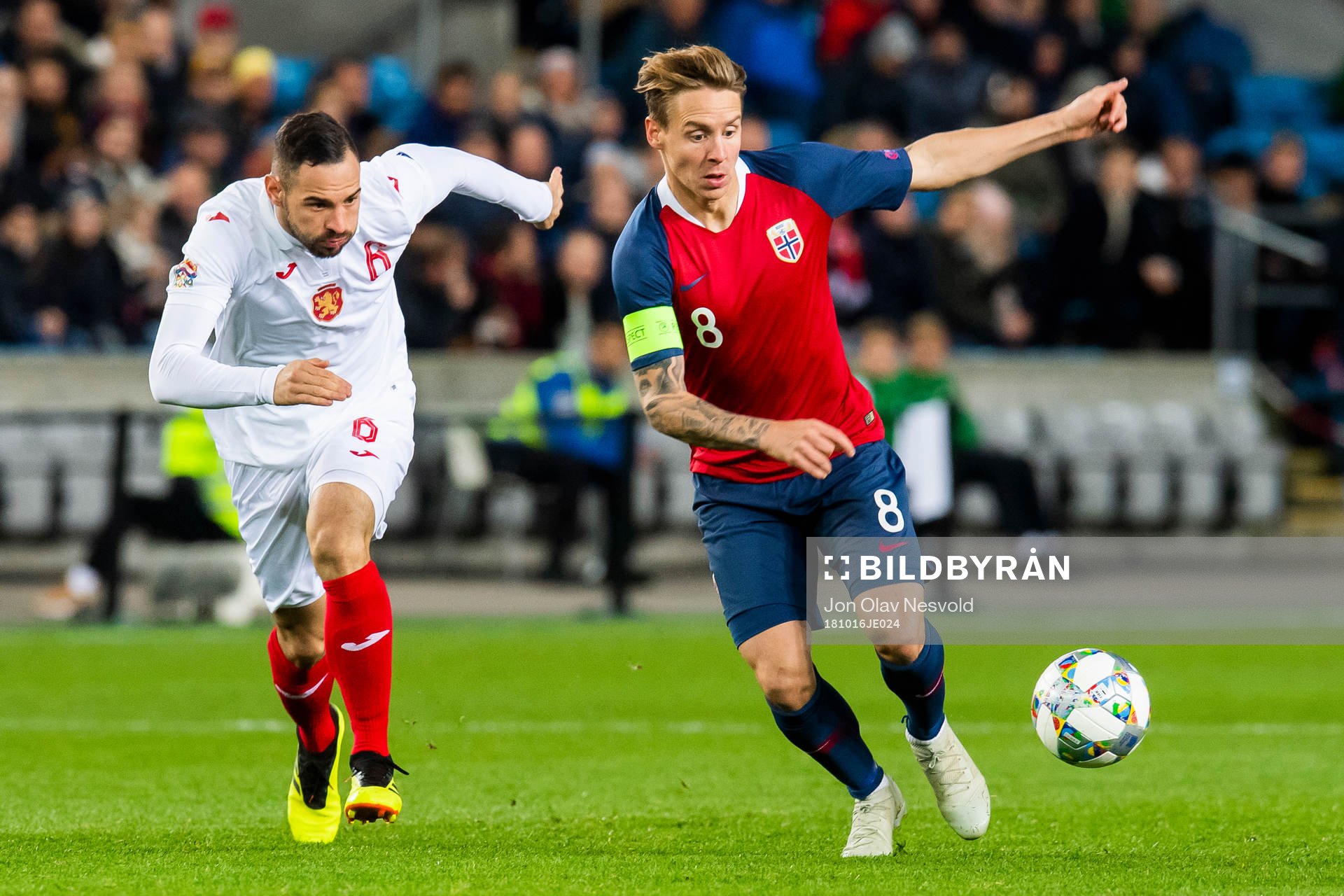 Simeon Slavchev of Bulgaria and Stefan Johansen of Norway during the Nations League match between Norway and Bulgaria on October 16, 2018 in Oslo.