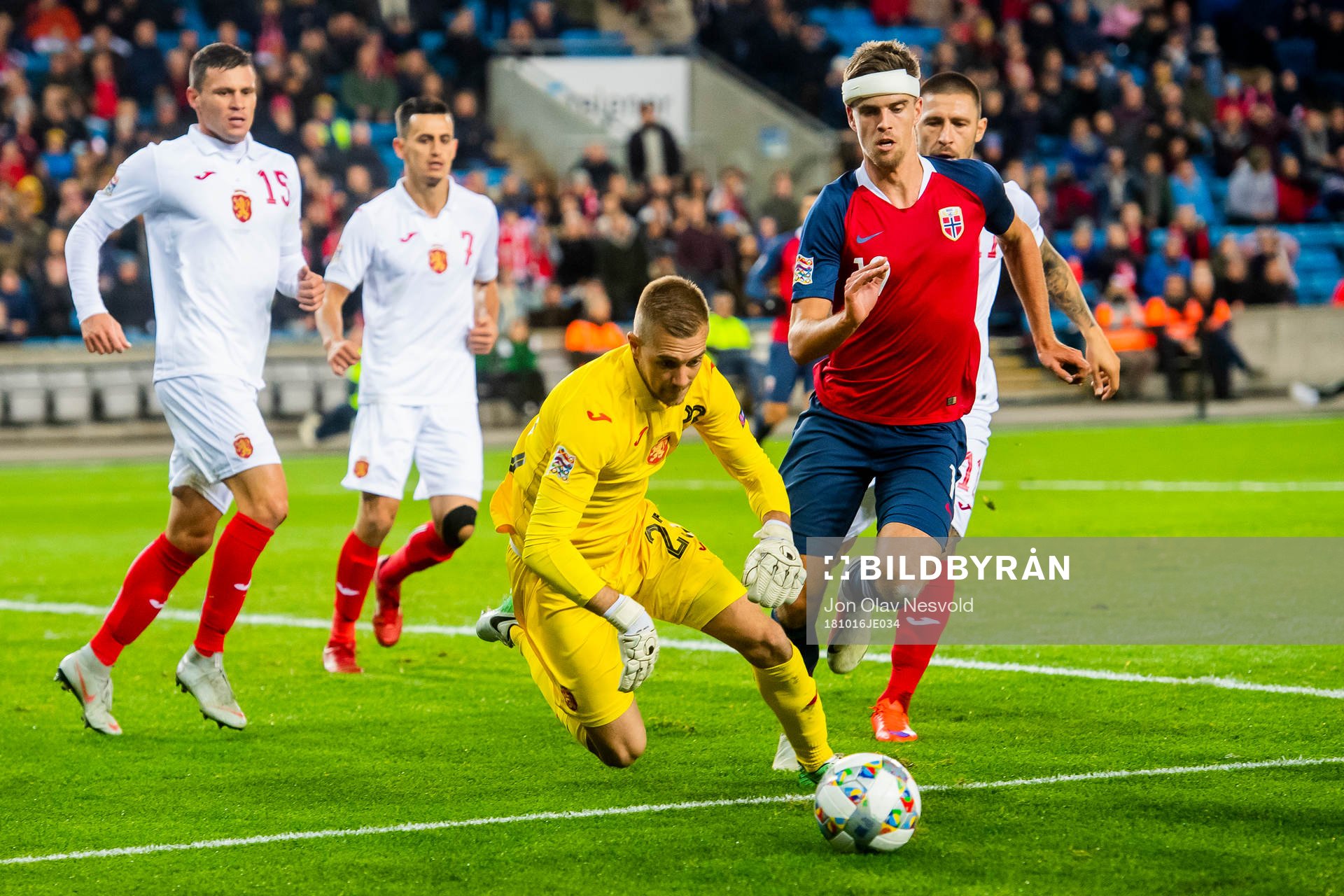 Goalkeeper Plamen Iliev of Bulgaria and Markus Henriksen of