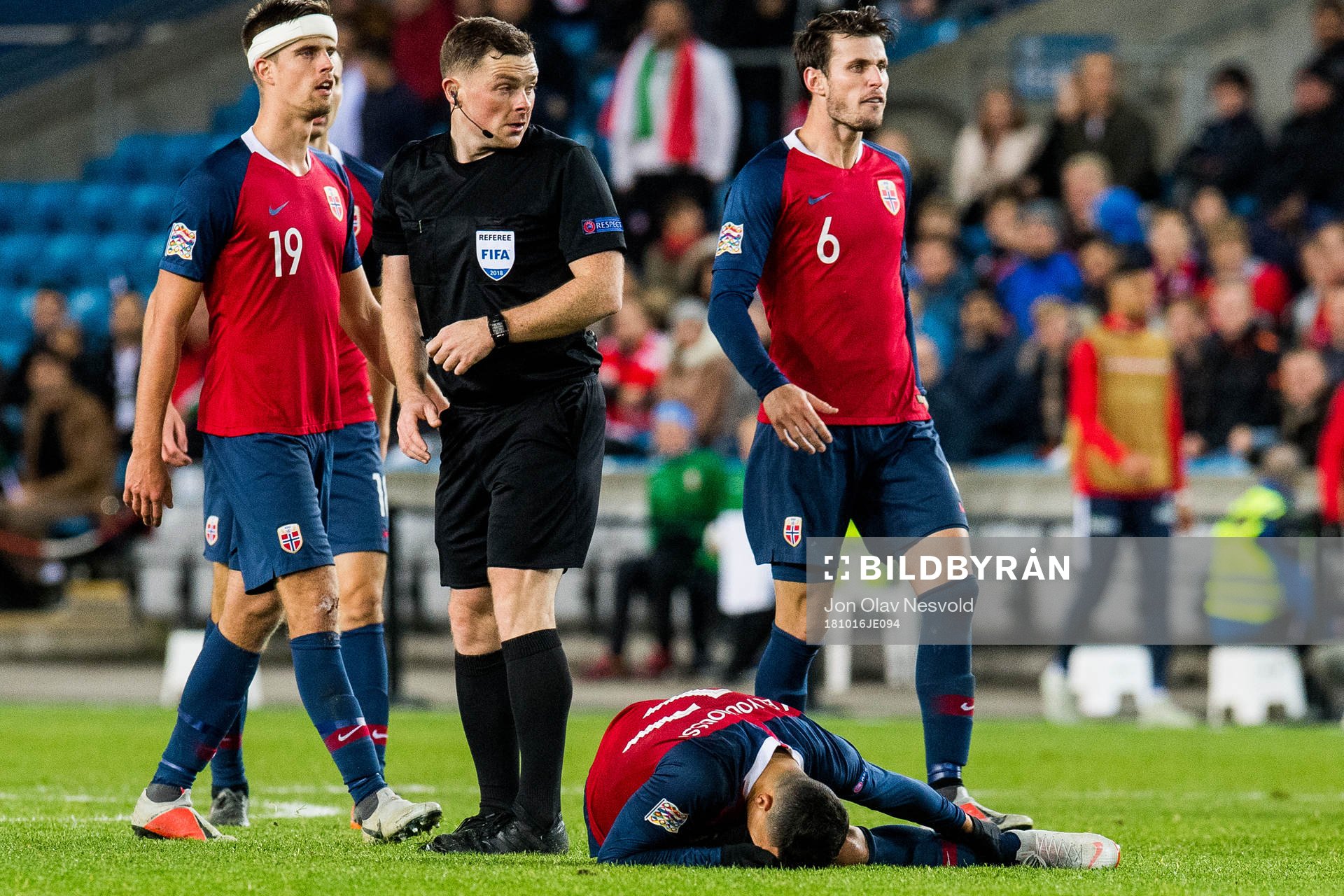 Markus Henriksen, referee John Beaton of Scotland, Mohamed