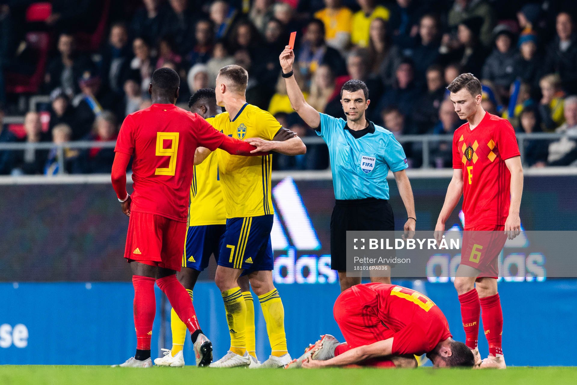 Isak Ssewankambo of Sweden receives a red card