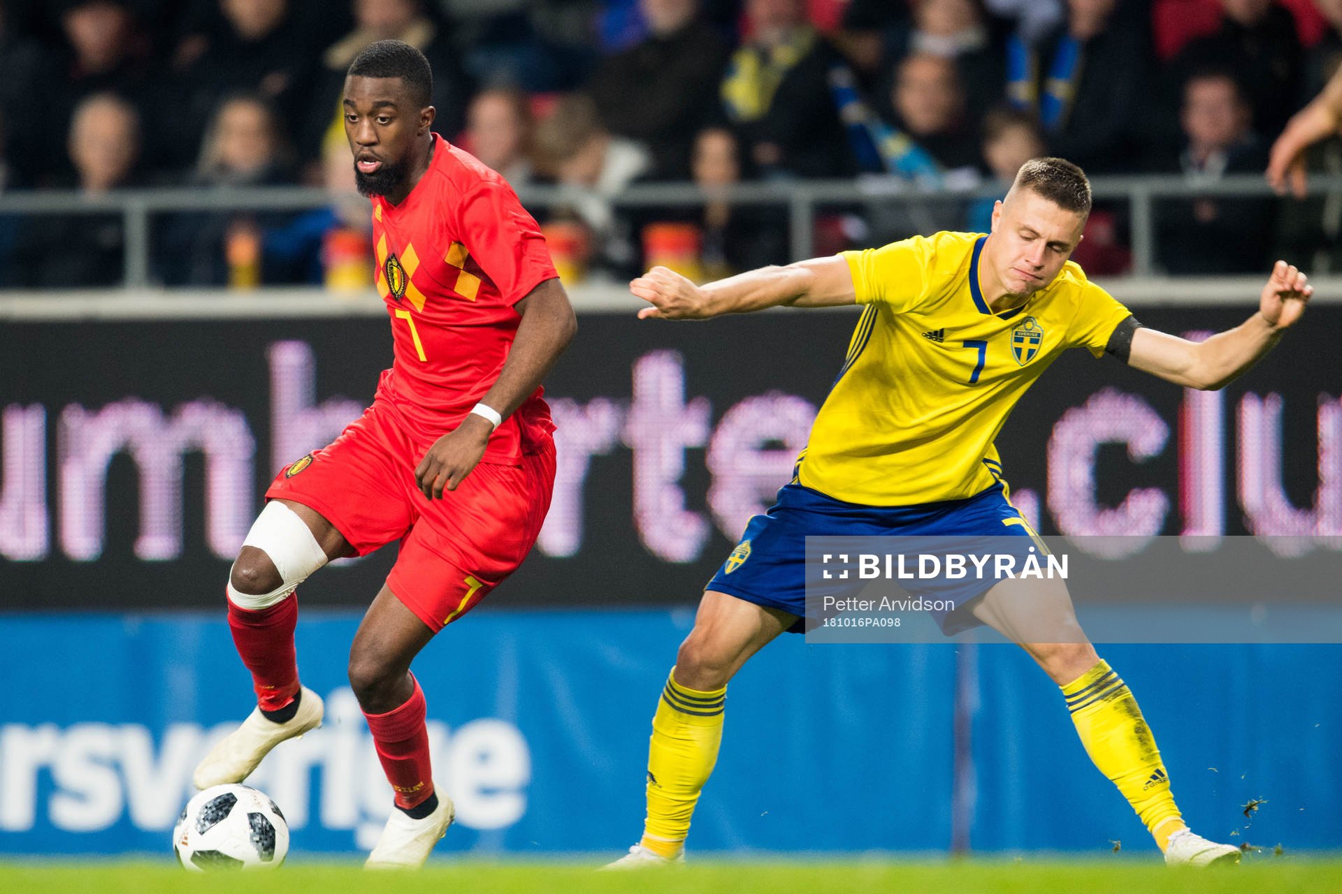 Isaac Mbenza of Belgium and Mattias Svanberg of Sweden